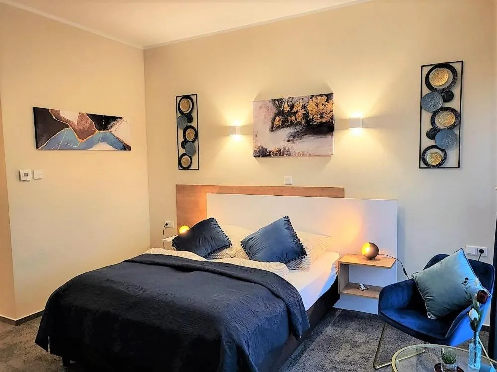 Bed in LikeDaheim Apartments