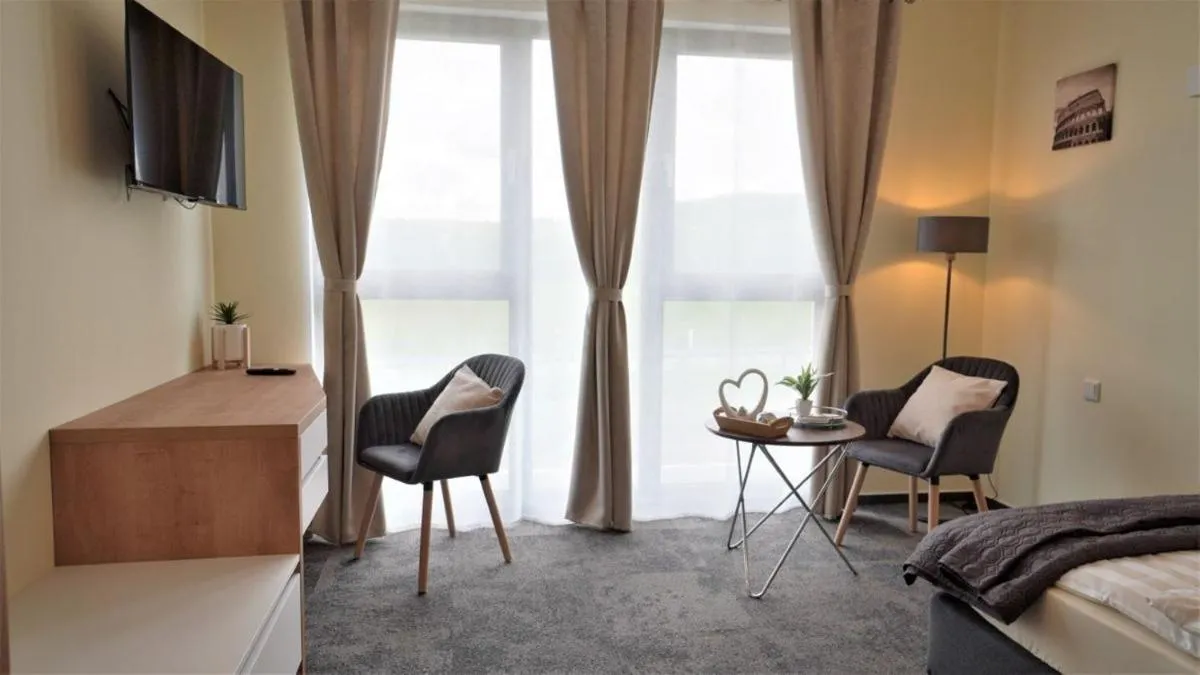 TV and multimedia, Bed in LikeDaheim Apartments