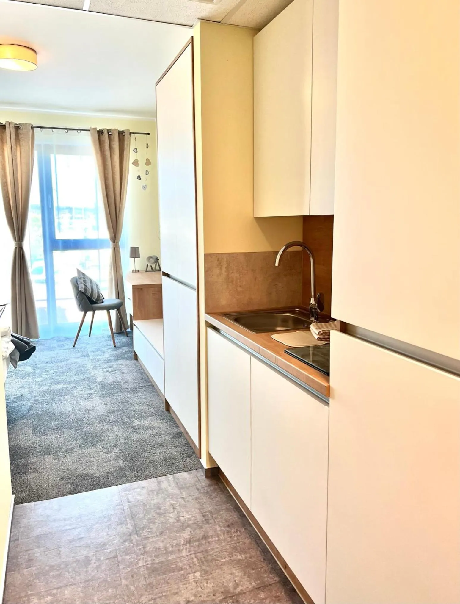 kitchen in LikeDaheim Apartments