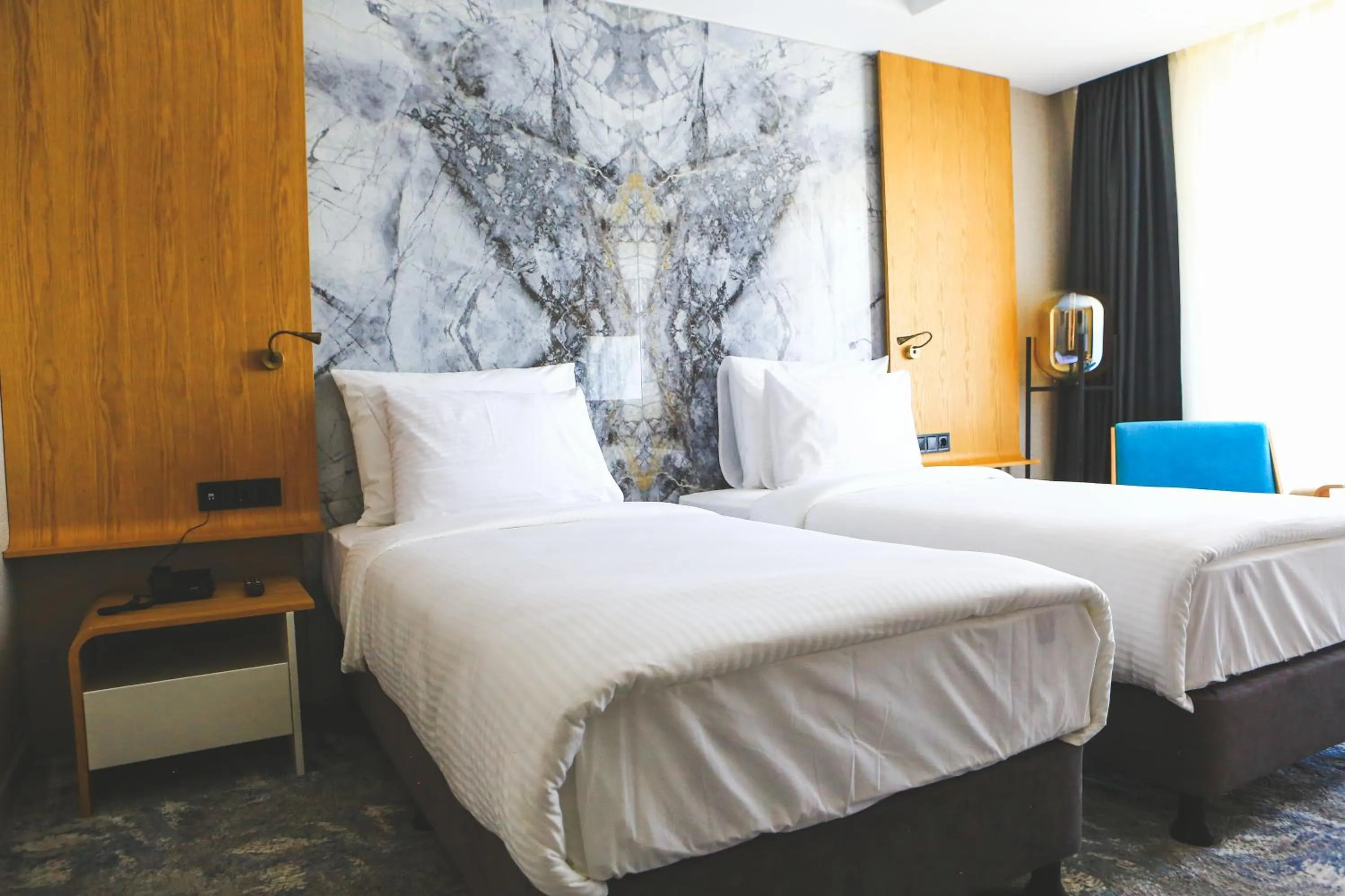 Bed in Grande Arte Hotel