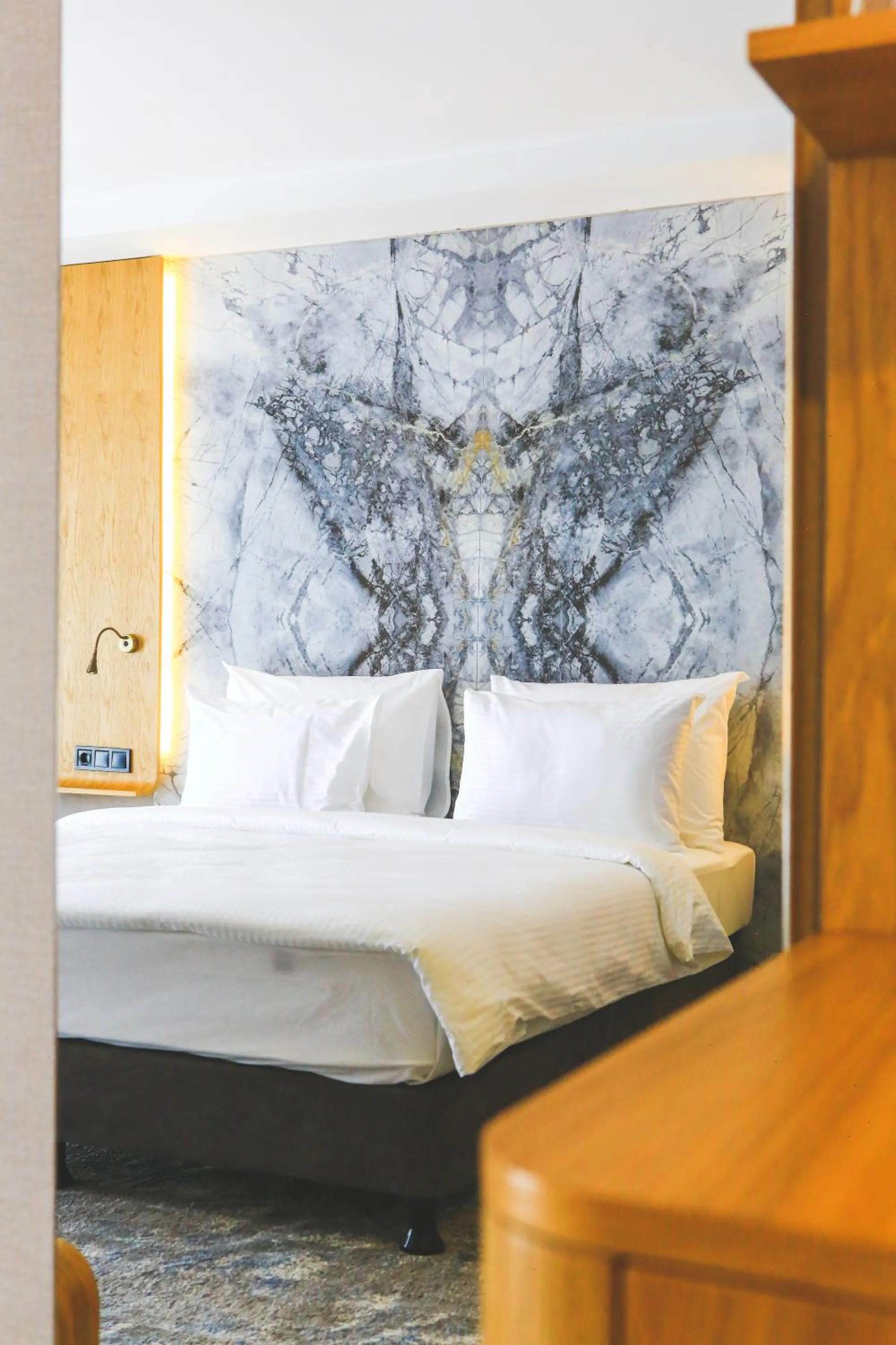 Bed in Grande Arte Hotel