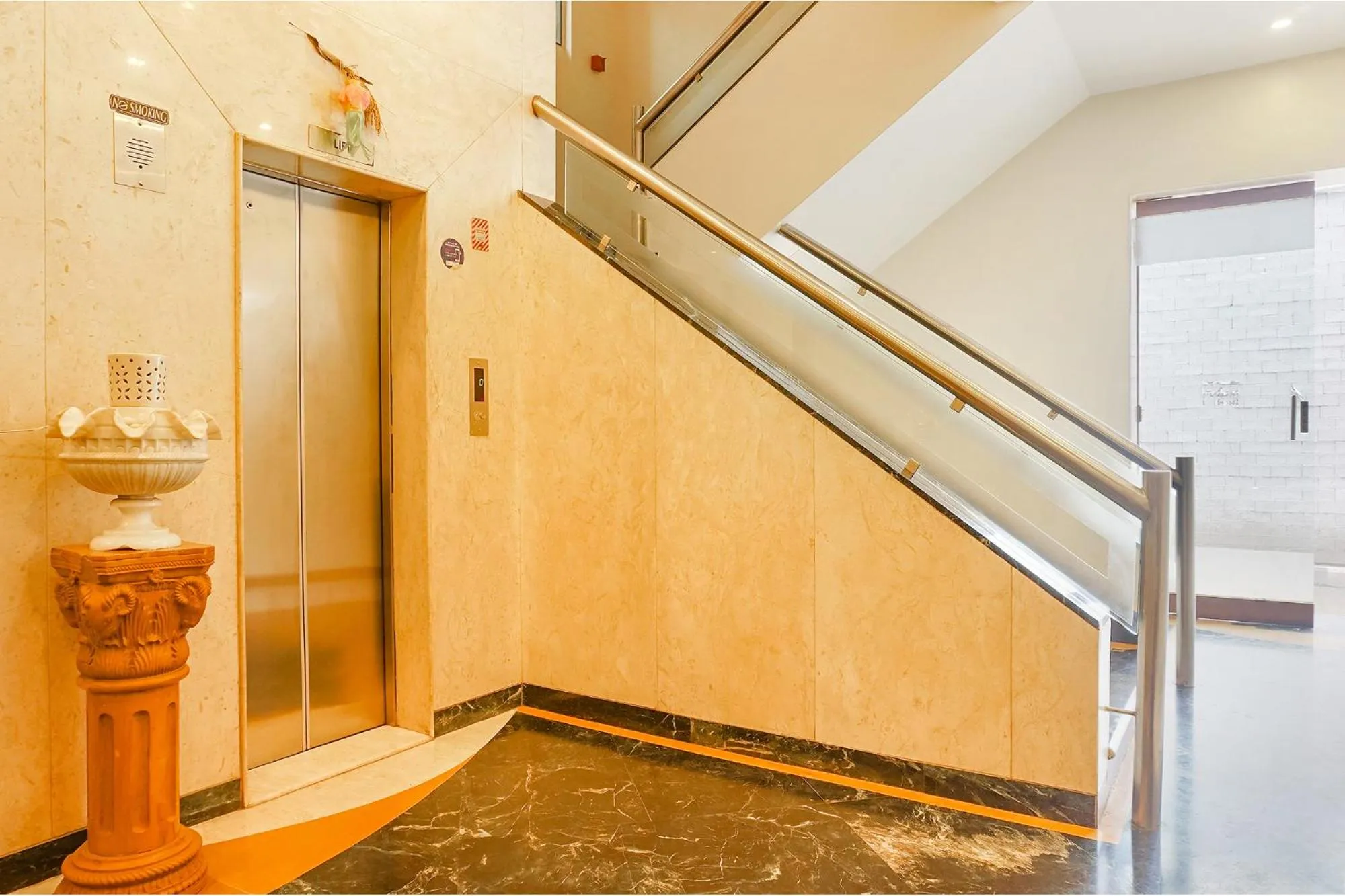 elevator in FabHotel Prime Golden Emerald - Nr St Mary's Church CNI