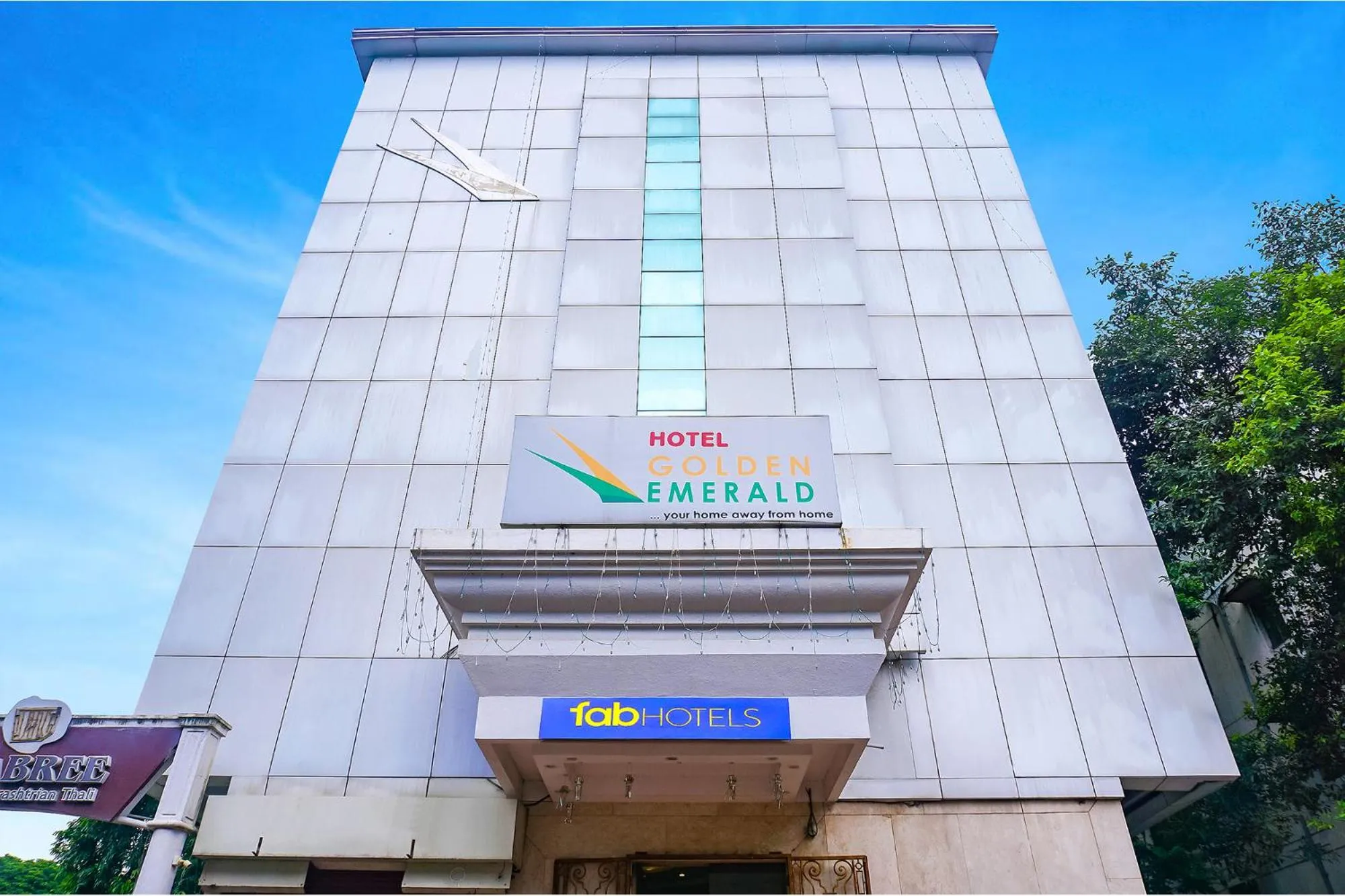 Property logo or sign in FabHotel Prime Golden Emerald - Nr St Mary's Church CNI