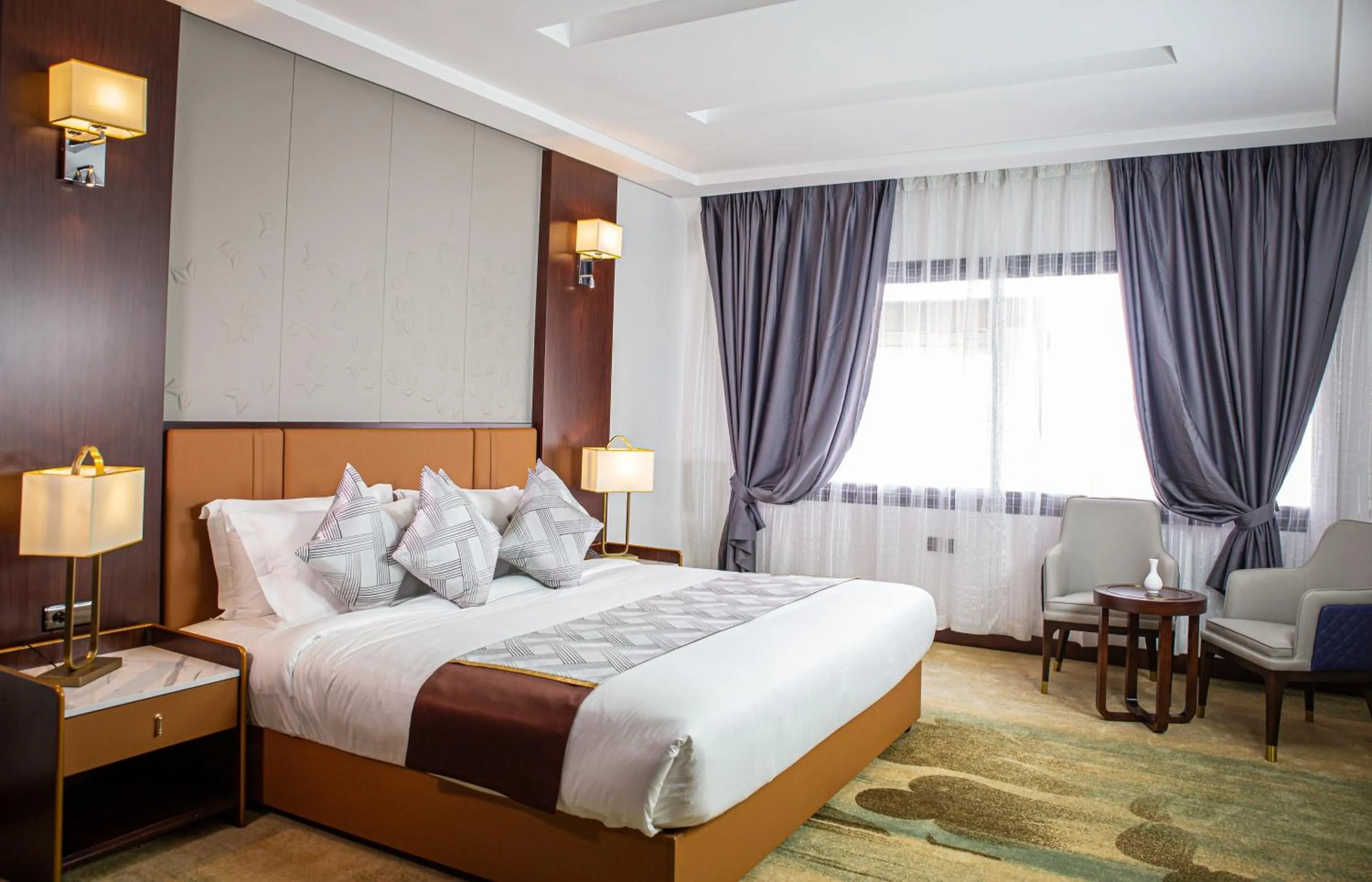 Seating area, Bed in Waves Aqua Resort