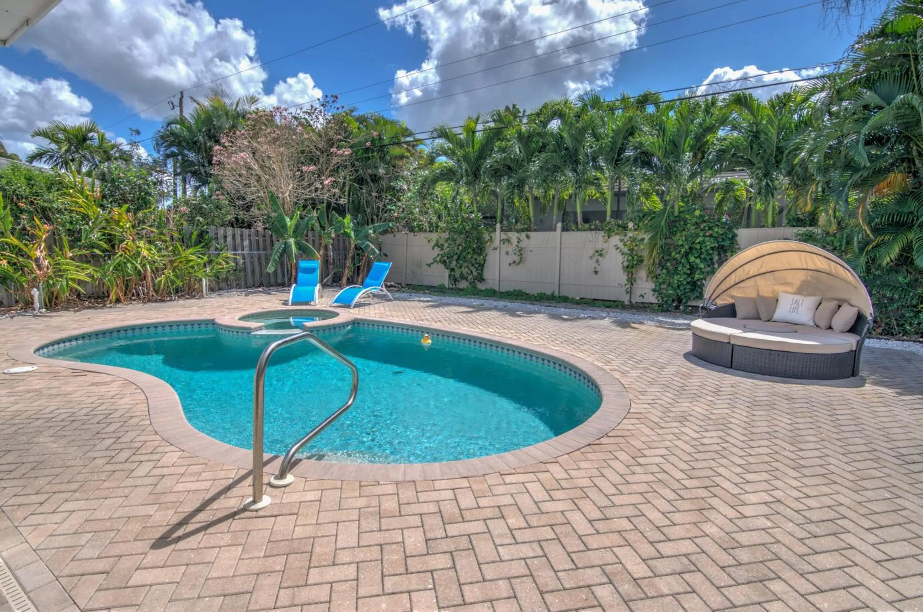 Relax Poolside & Walk or Bike to the Beach From This Amazing Naples Pool Home!