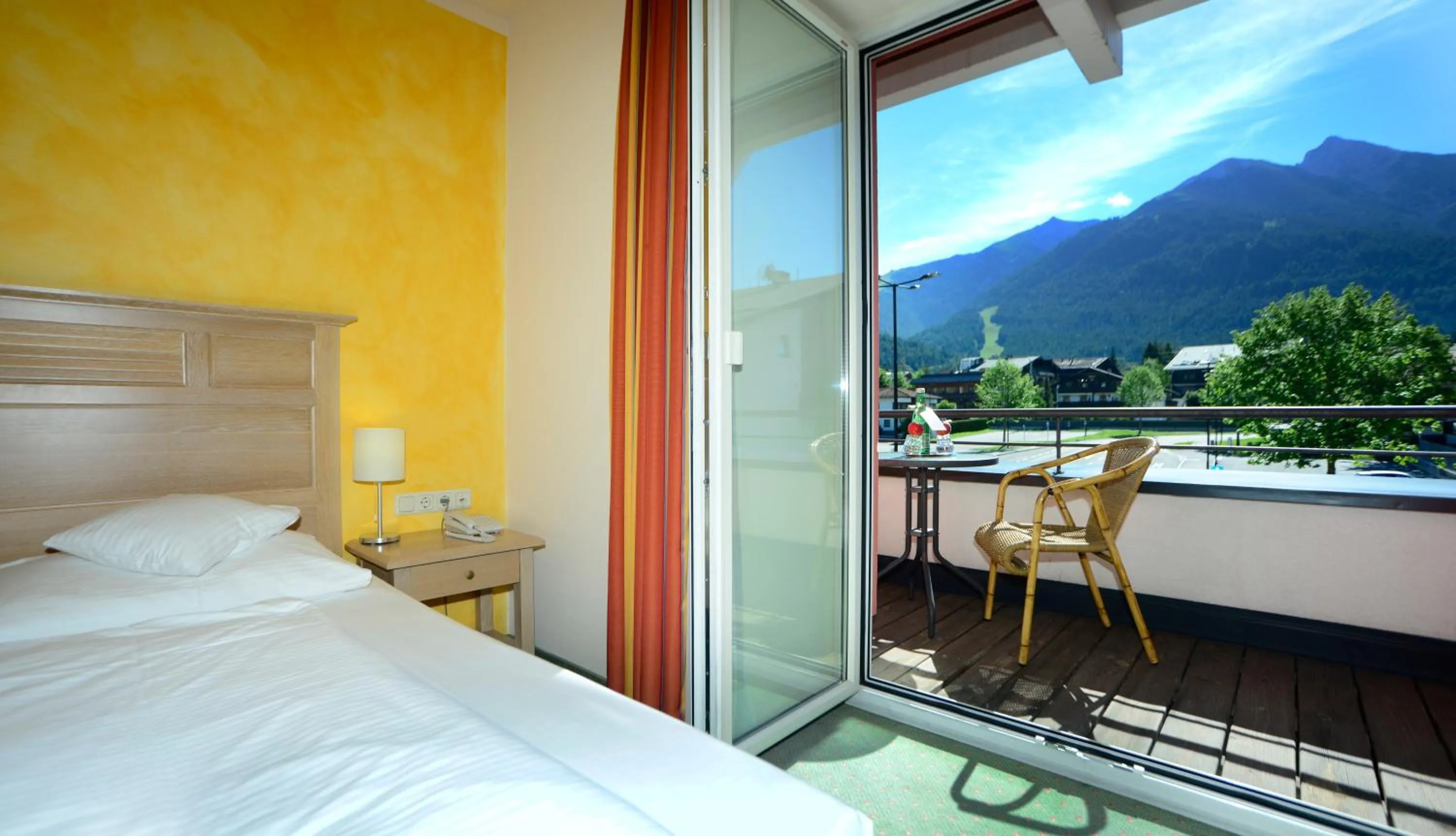 Photo of the whole room, Bed in Das Hotel Eden - Das Aktiv- & Wohlfühlhotel in Tirol auf 1200m Höhe