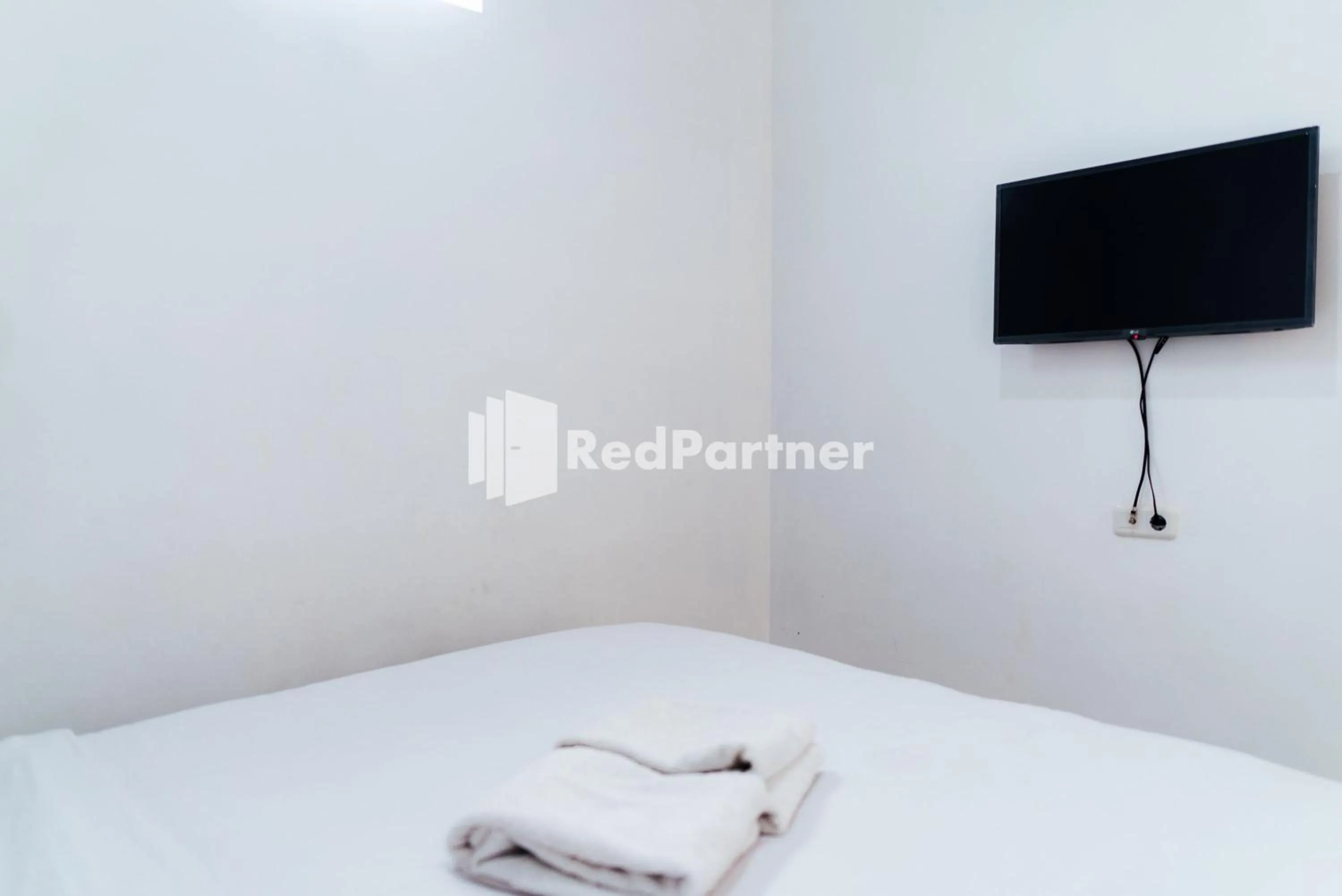 Bedroom in Aksara Homestay Syariah Mitra RedDoorz