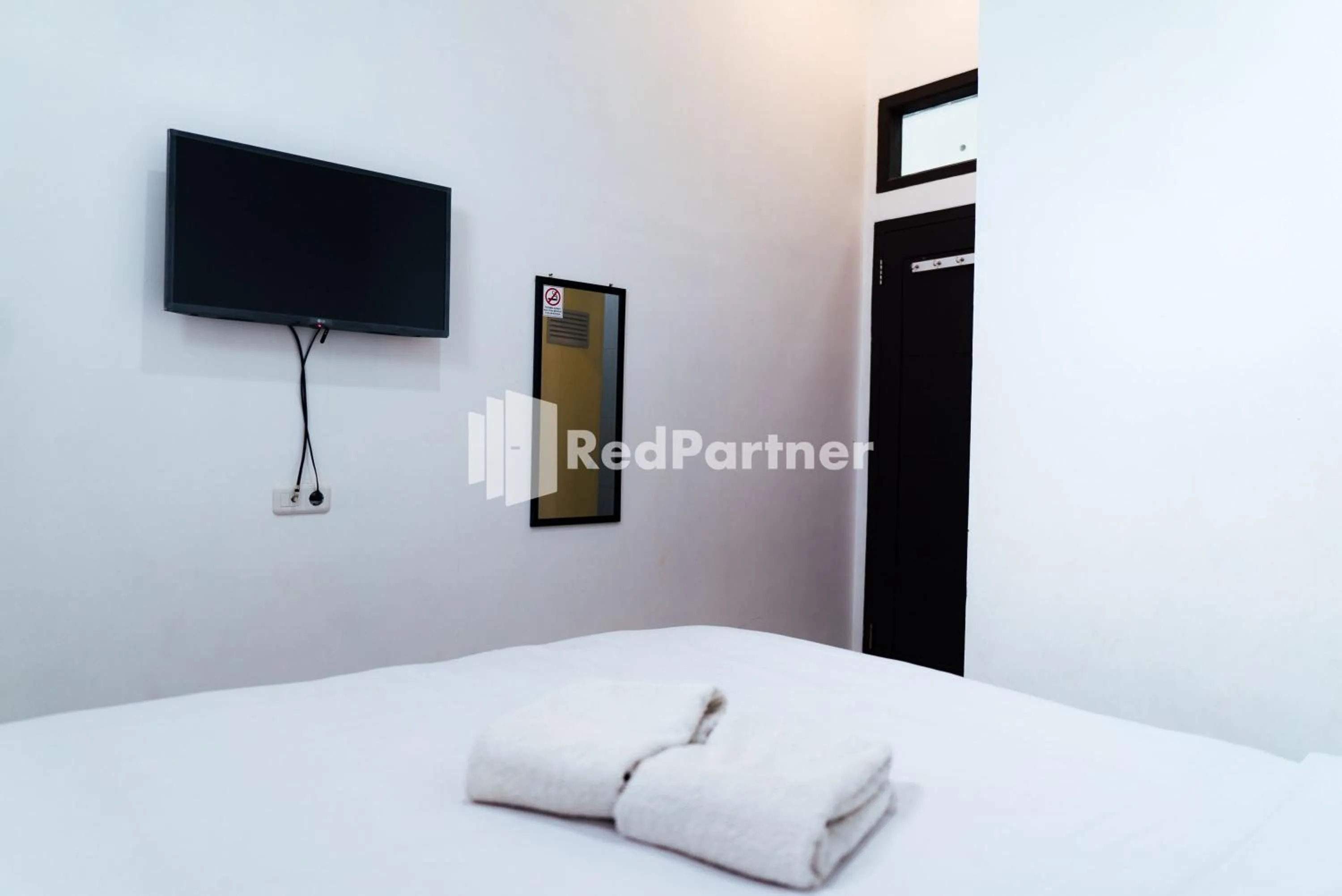 Bedroom in Aksara Homestay Syariah Mitra RedDoorz