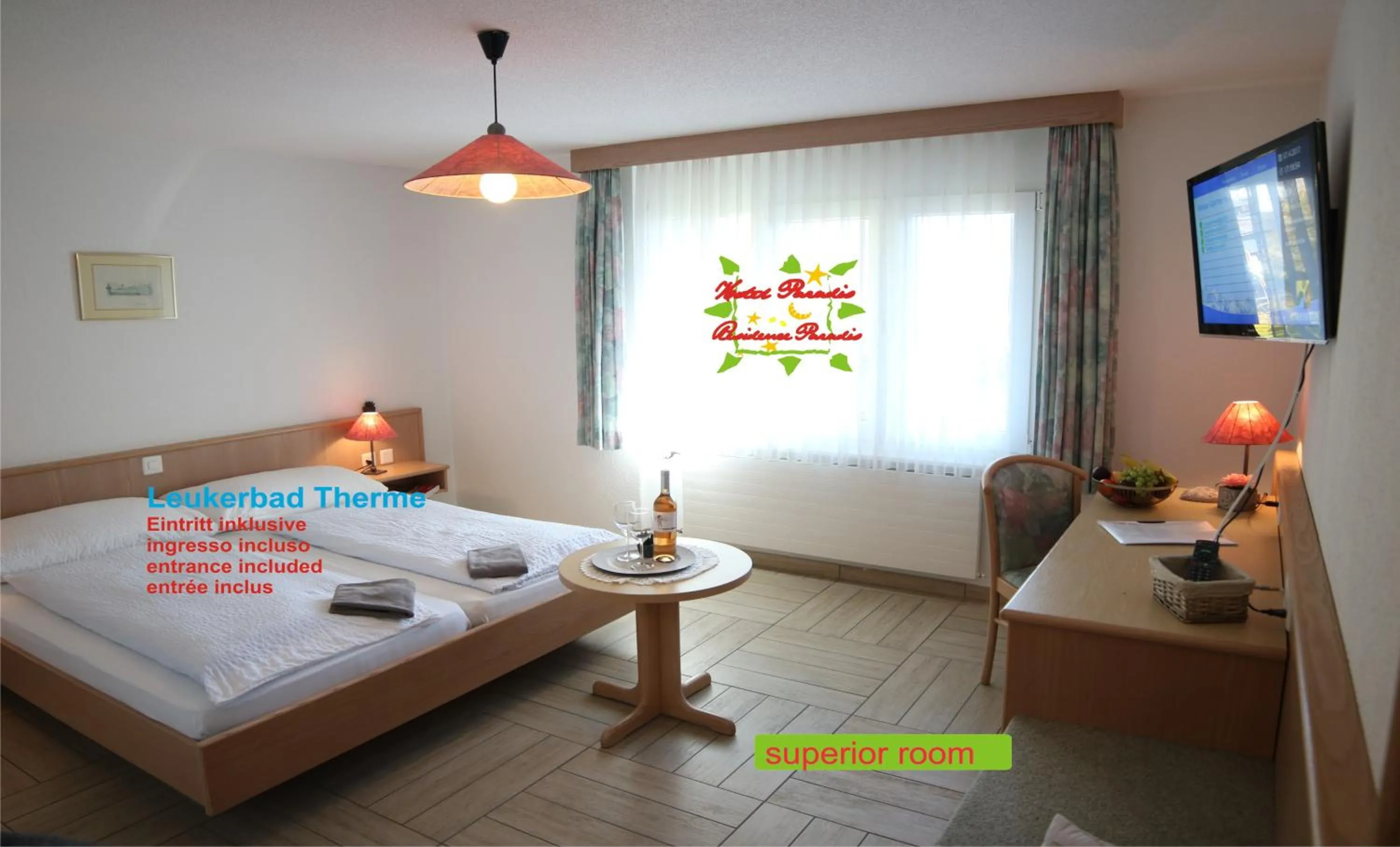 Seating area, Bed in Hotel Paradis-Leukerbad-Therme