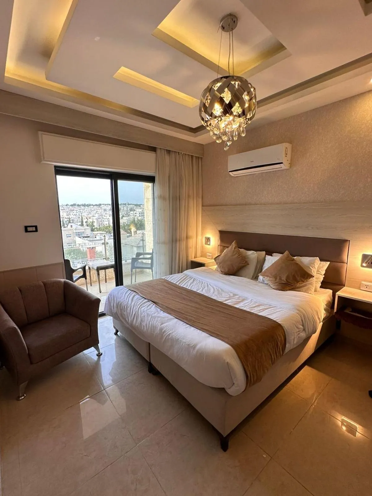 Photo of the whole room, Bed in AlQimah Hotel Apartments
