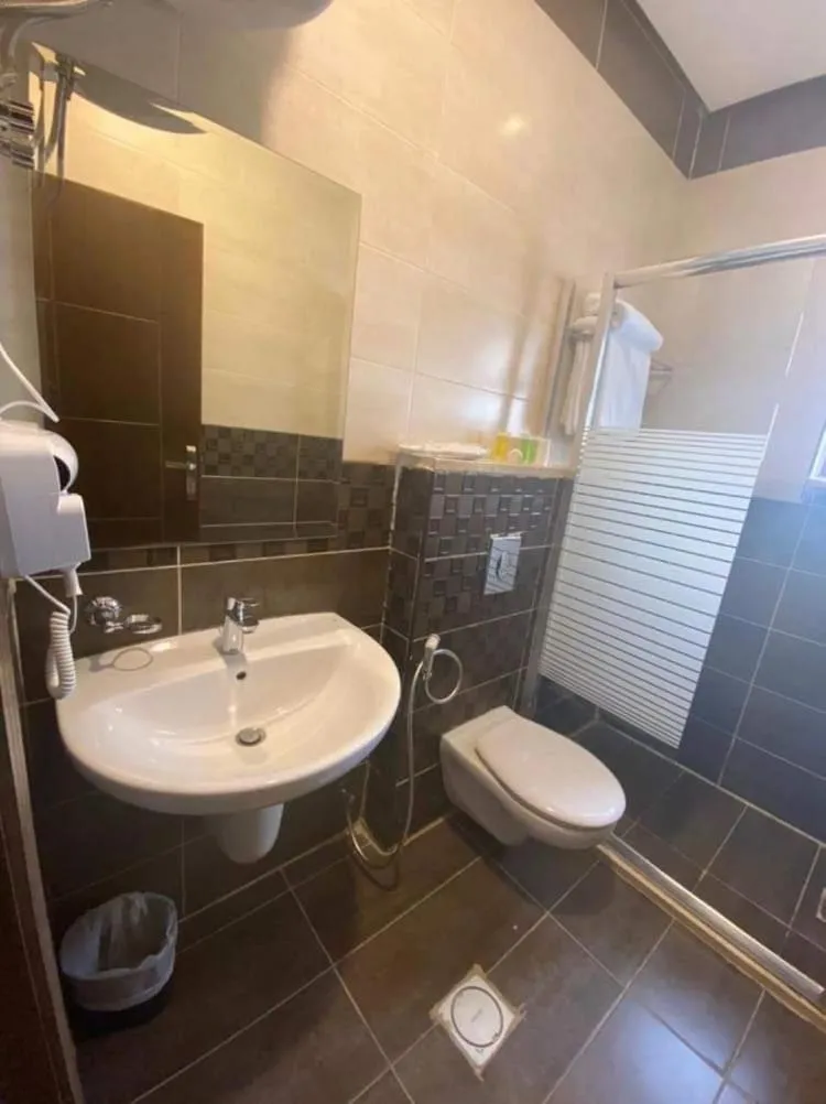 Bathroom in AlQimah Hotel Apartments
