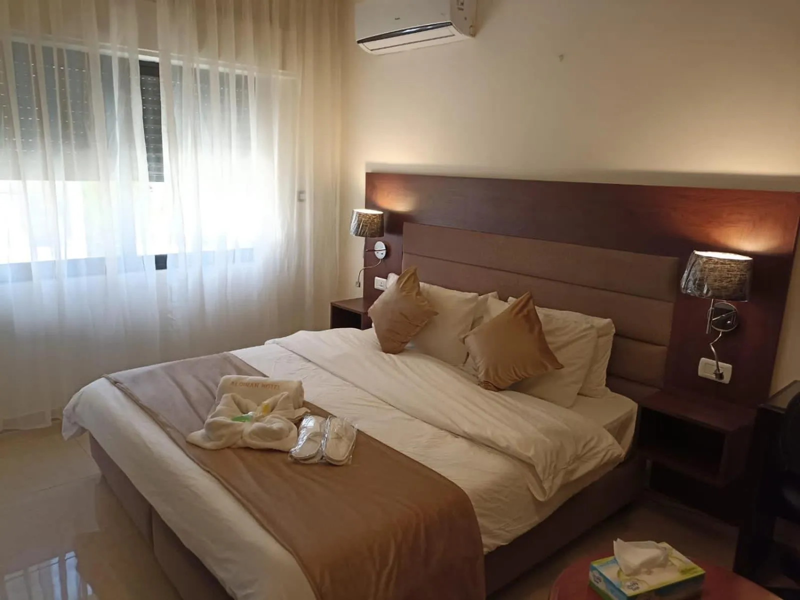 Bed in AlQimah Hotel Apartments