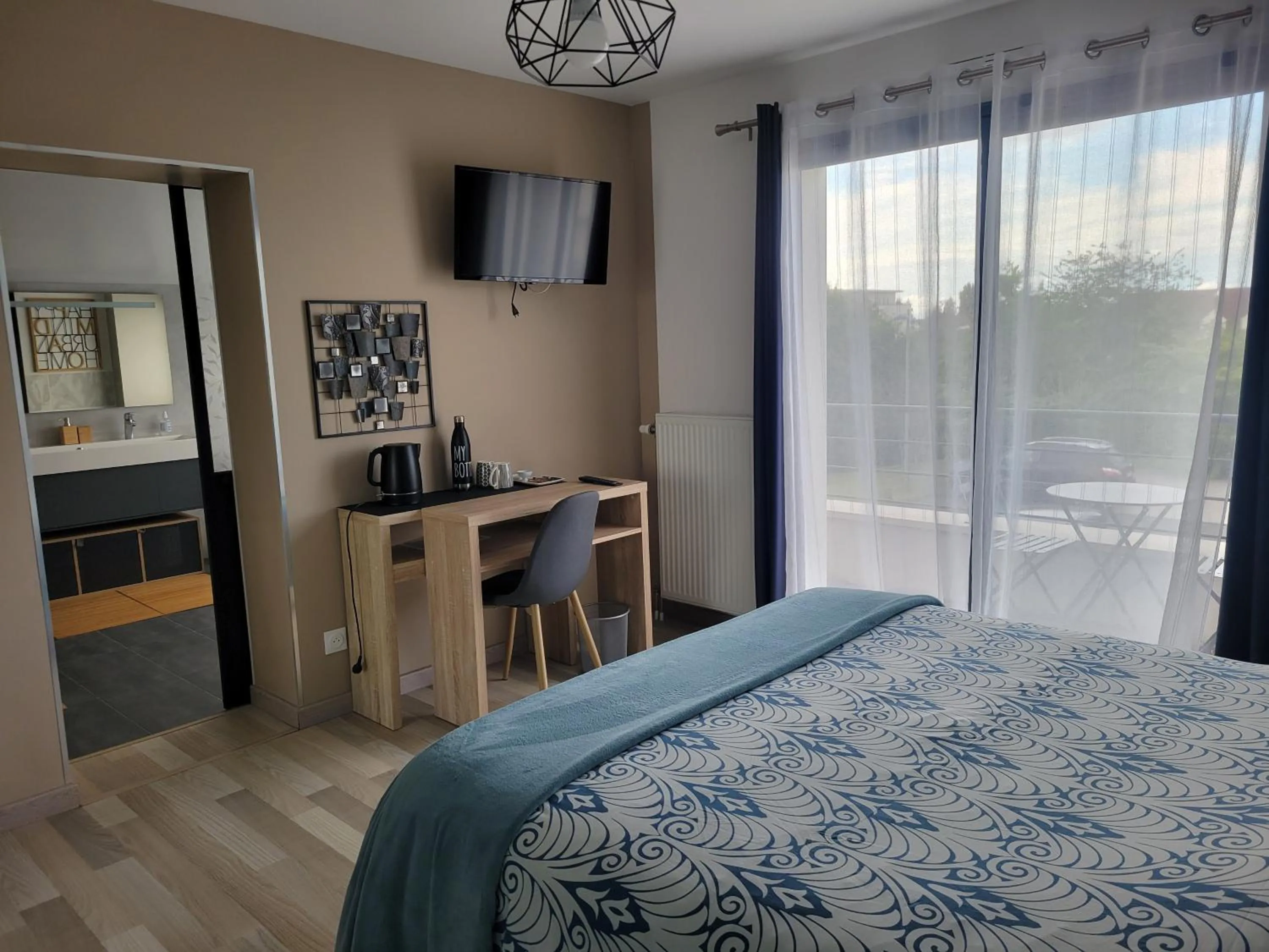 Bed in Chambres d'hôtes dans maison contemporaine