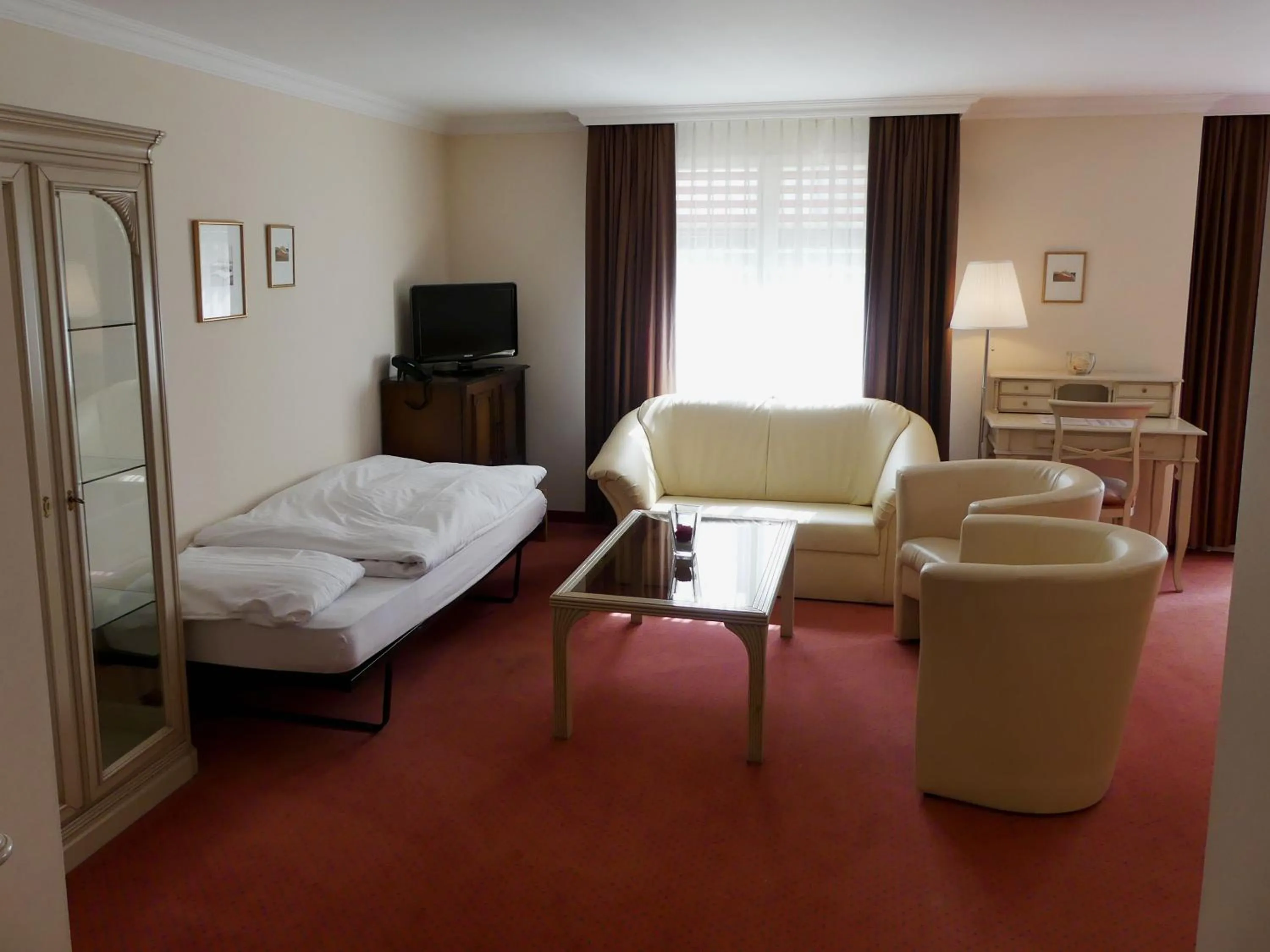 Photo of the whole room, Bed in Hotel Rigi Vitznau