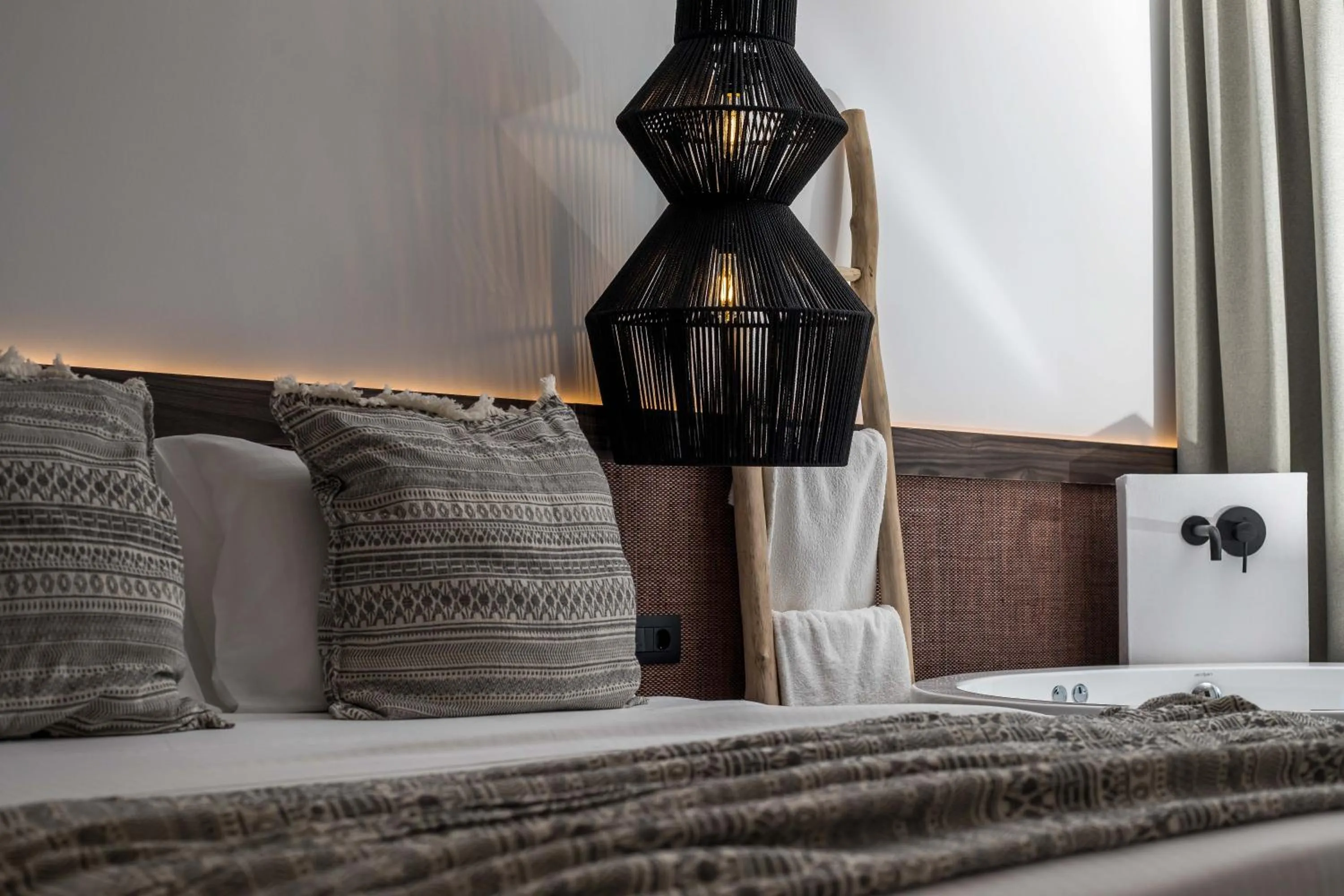 Seating area, Bed in Vanik Suites