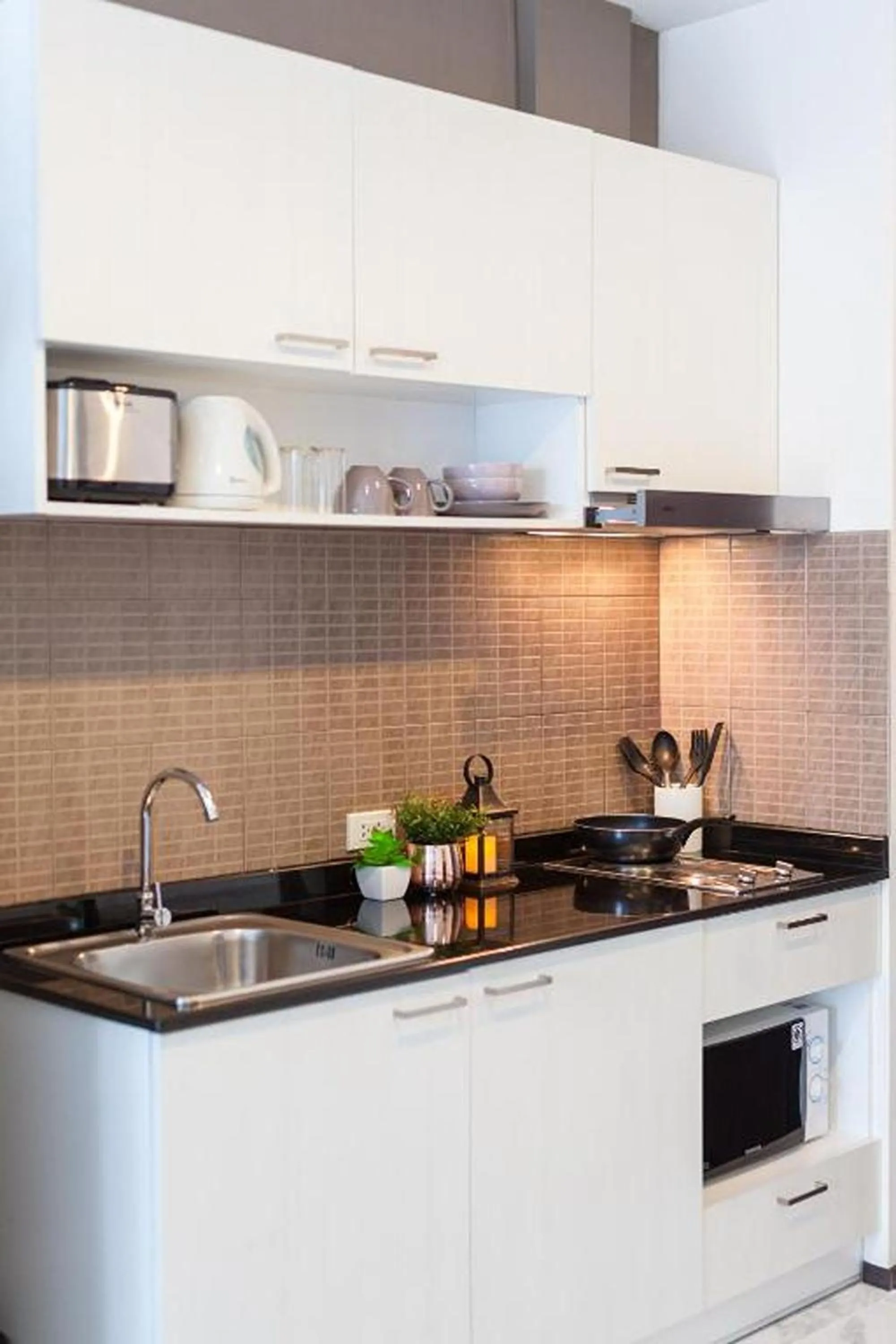 Kitchen or kitchenette in The Title Beach Front