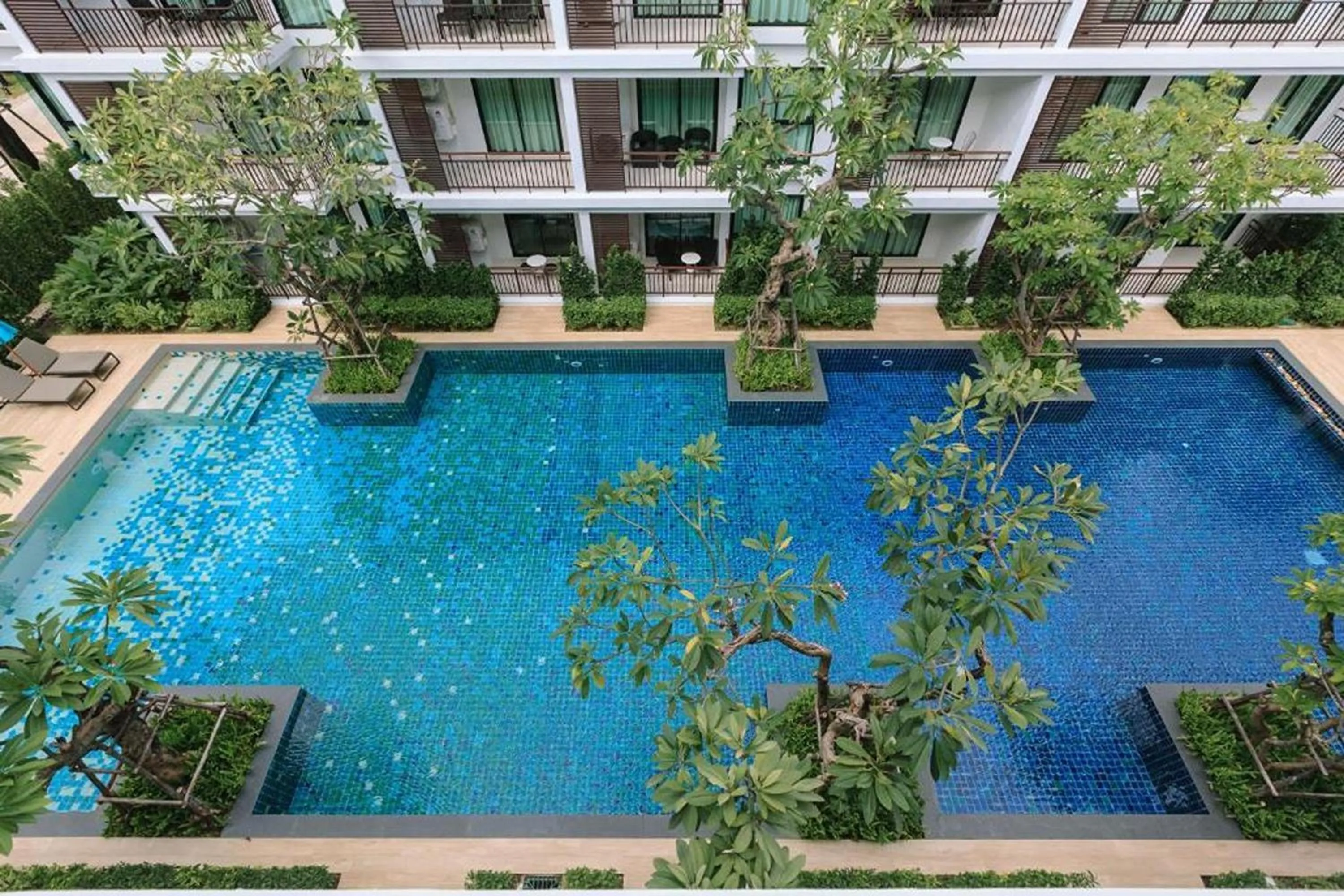 Swimming pool in The Title Beach Front
