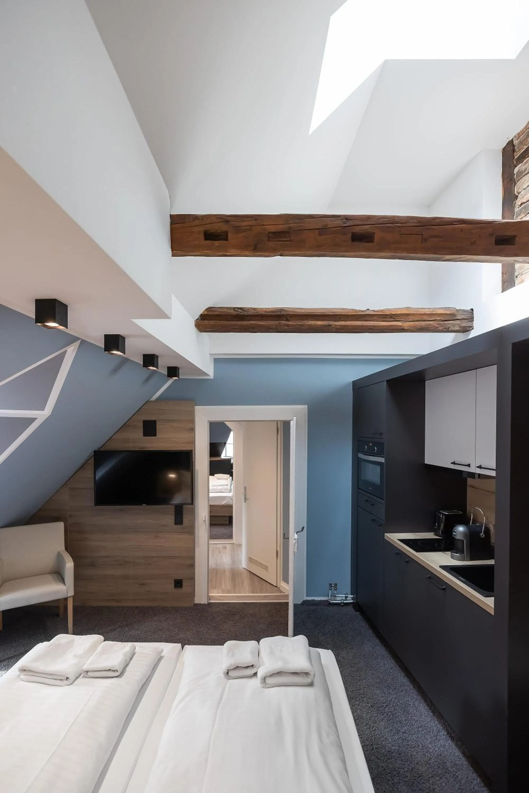 Kitchen or kitchenette, Bed in Oldtown Studios by dasPaul