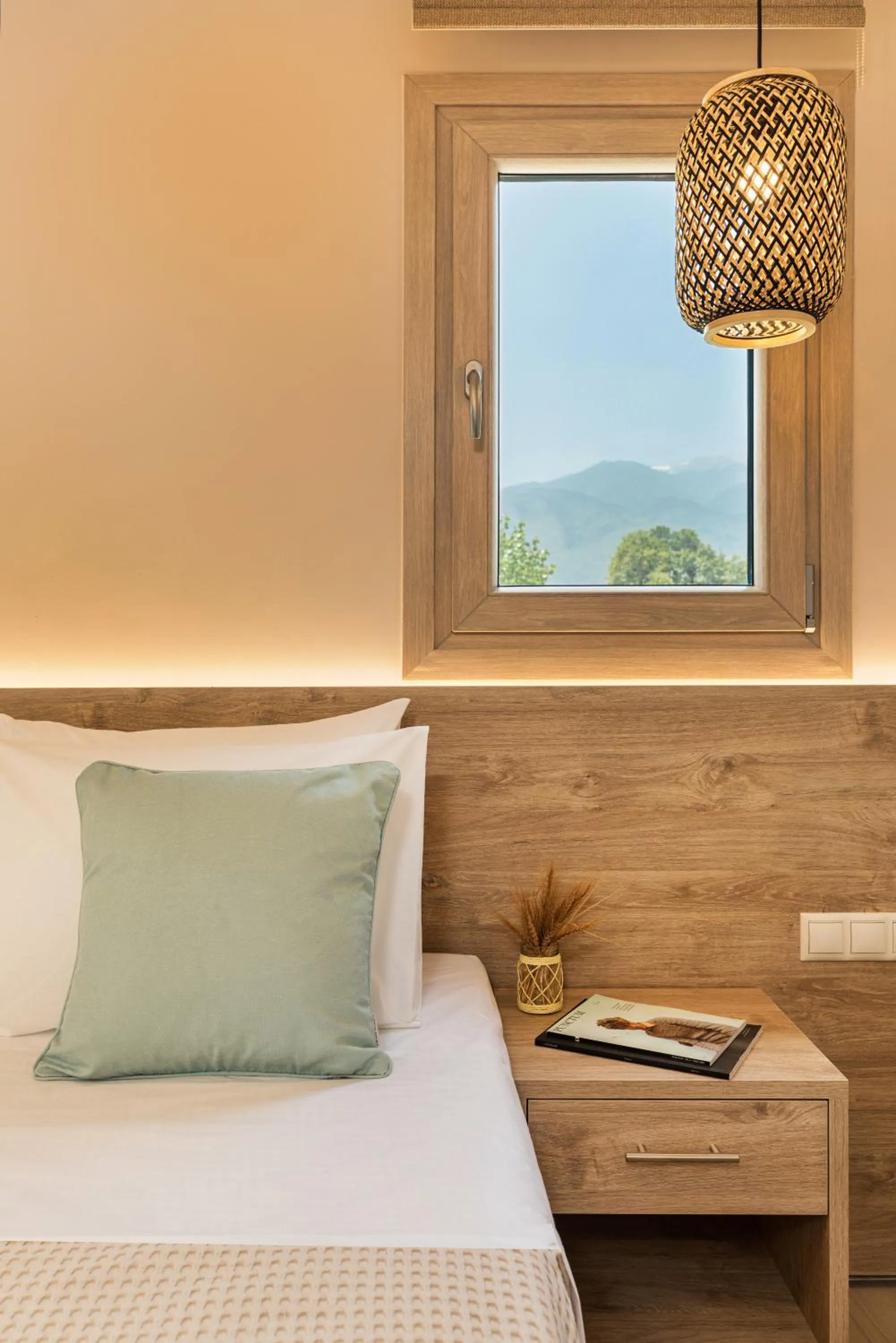 Bed in Makris Luxury Rooms