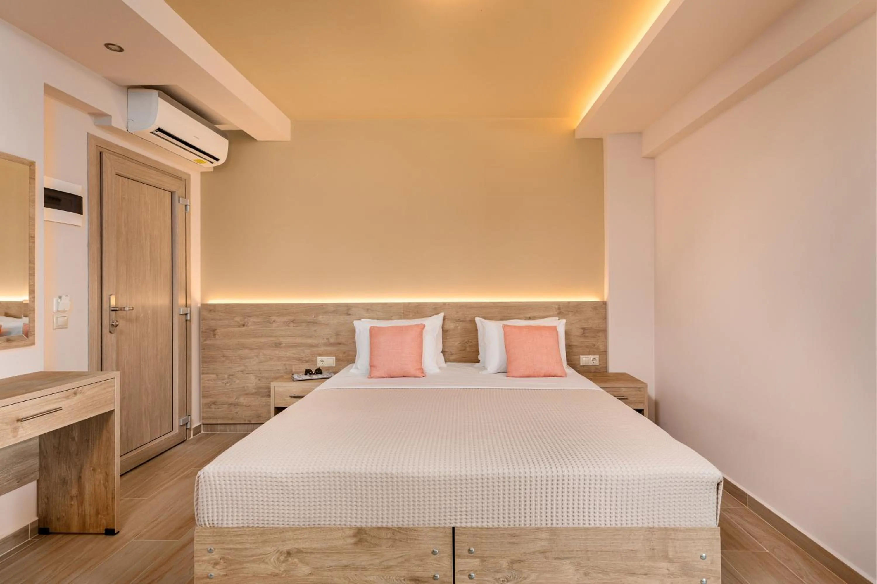 Bed in Makris Luxury Rooms