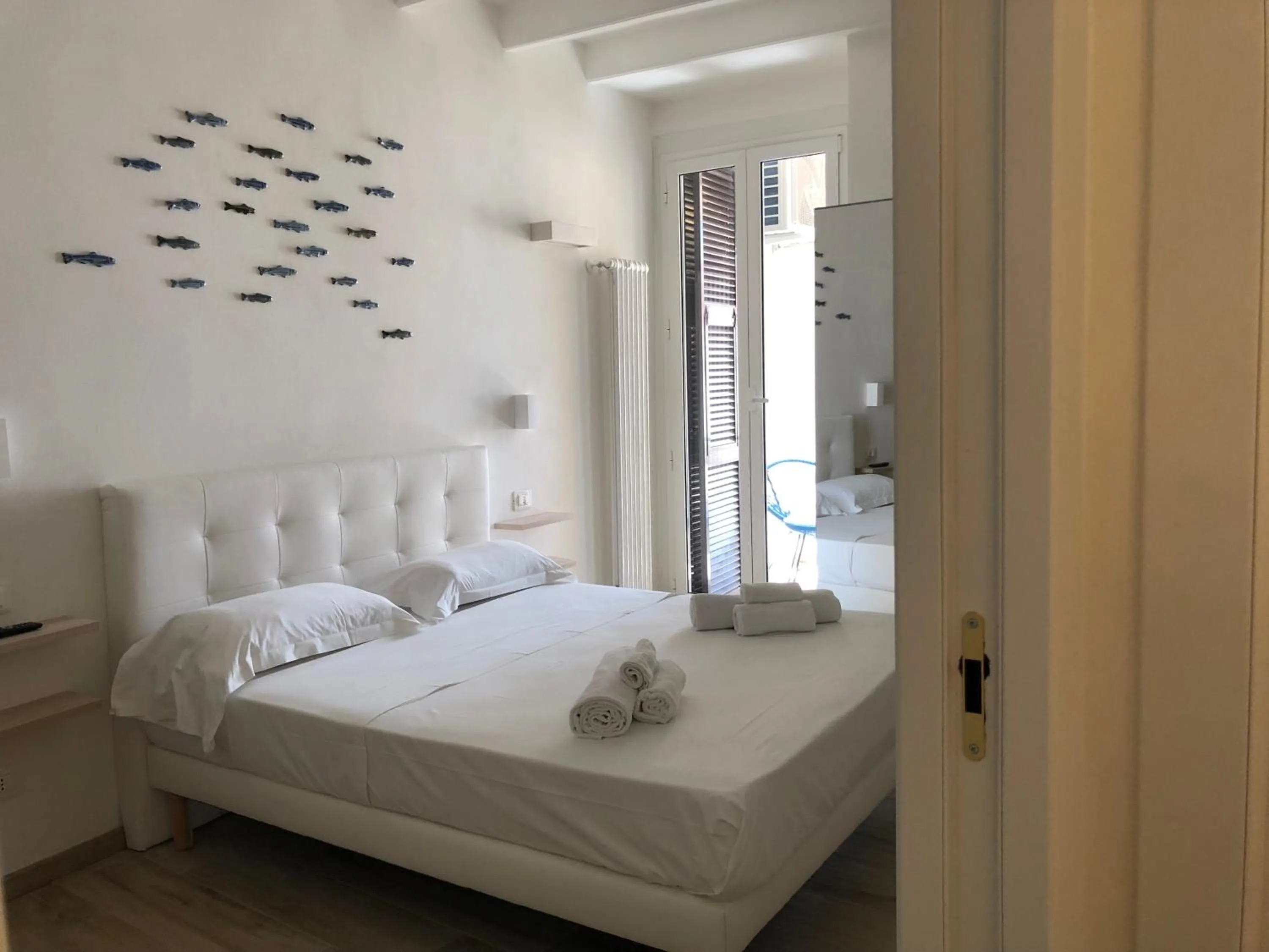 Bedroom in PORTOROSSO Rooms