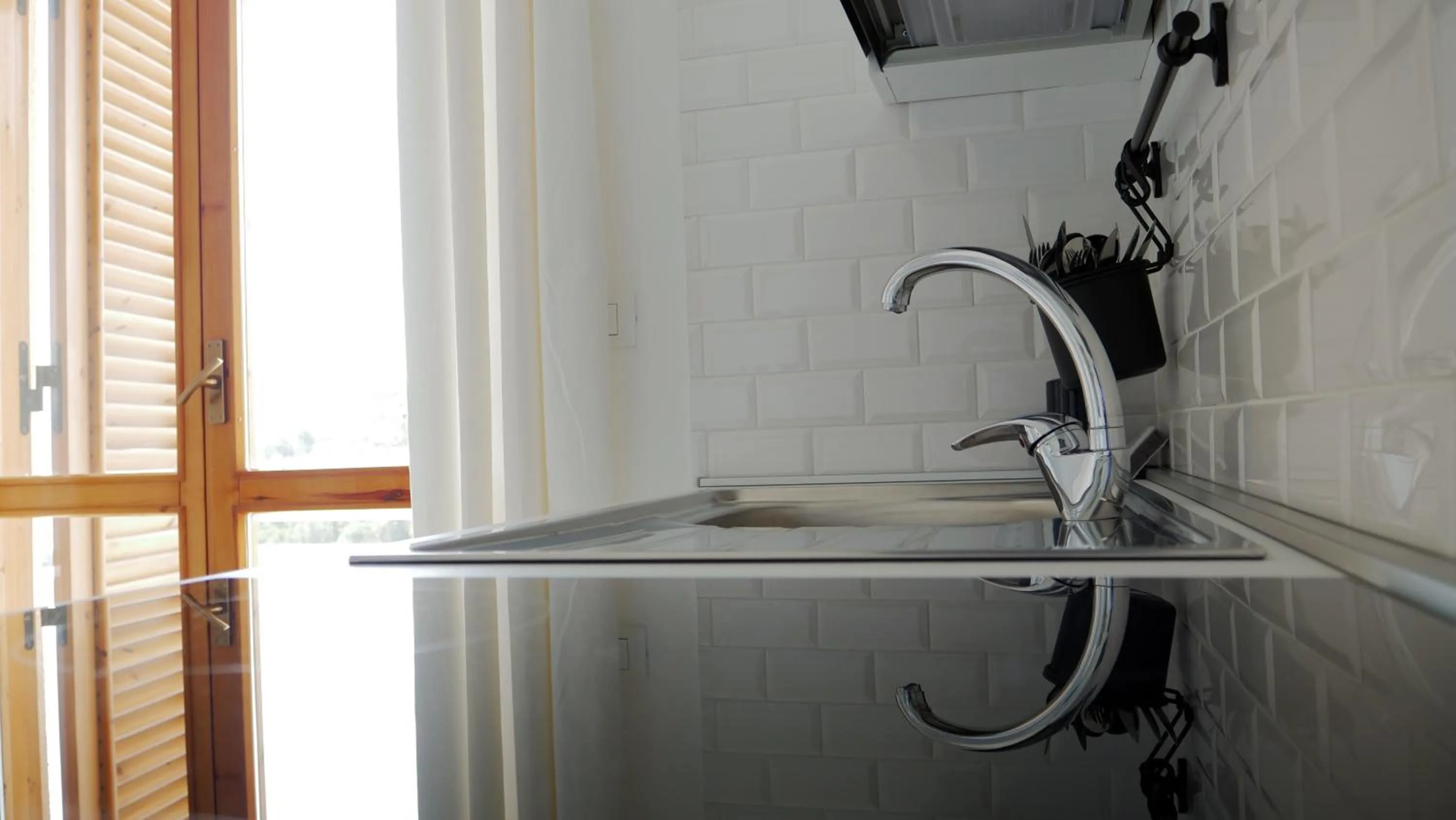 Kitchen or kitchenette in Talìa Residence