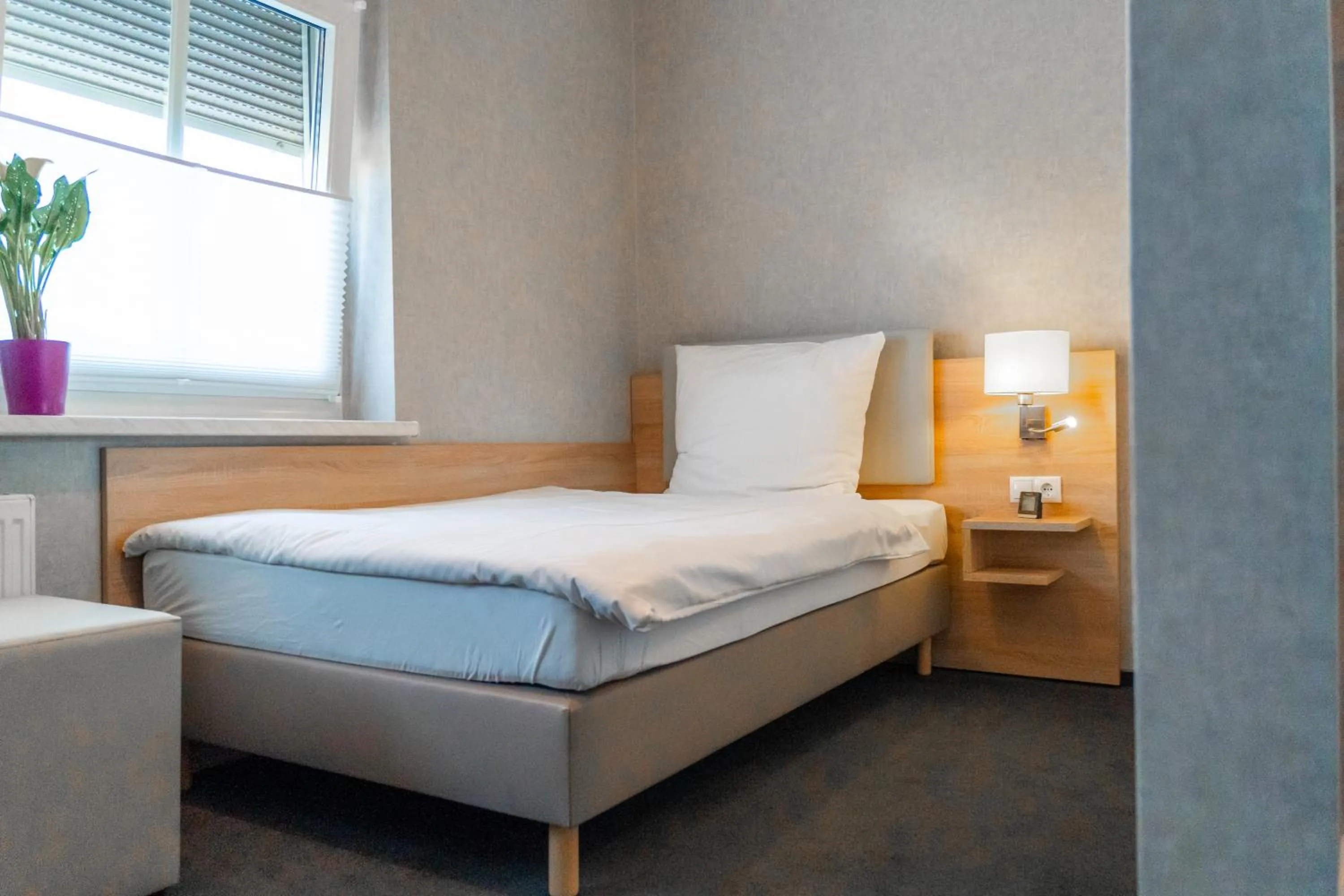 Bed in Ambient Hotel Zum Schwan