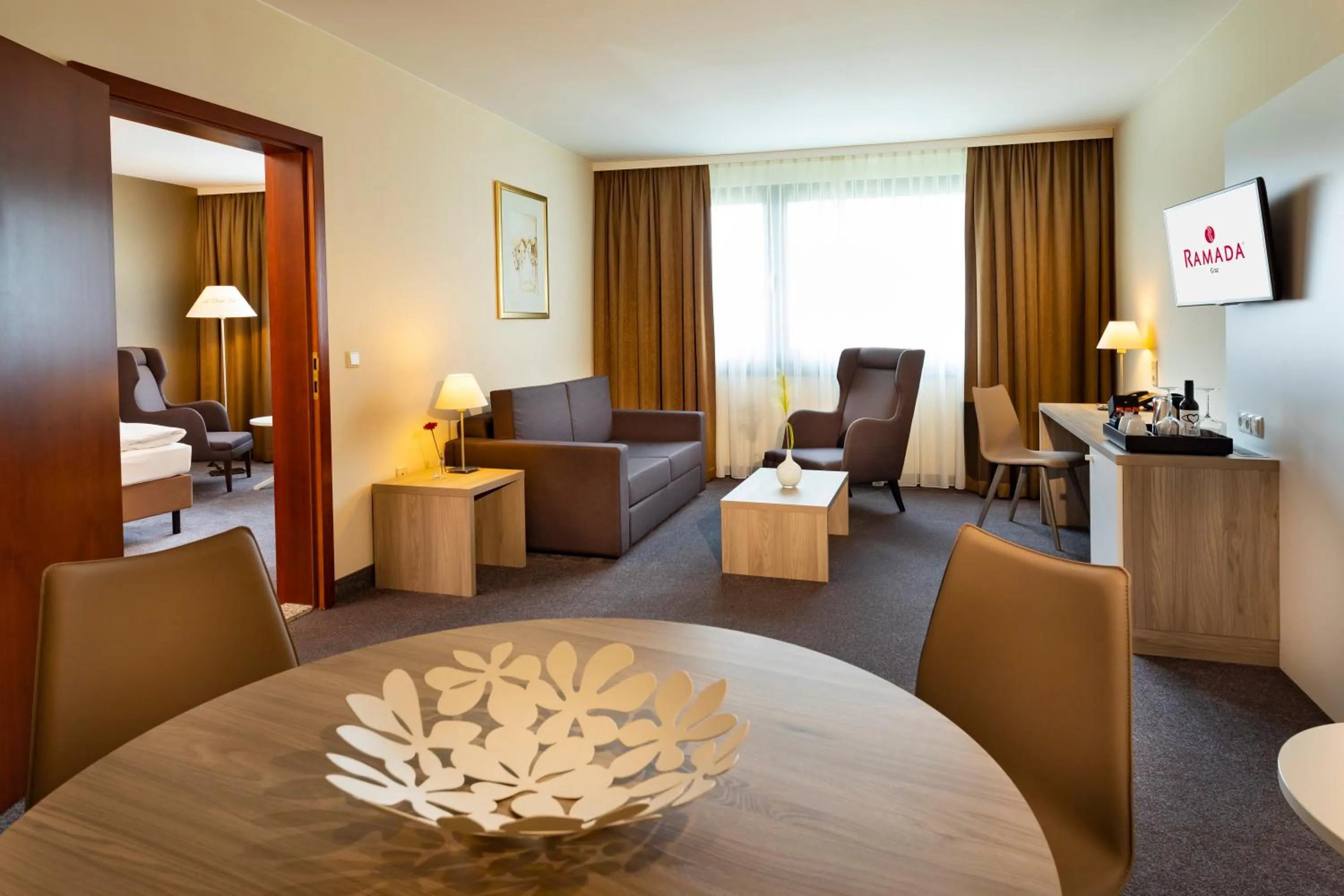 TV and multimedia in Hotel Ramada by Wyndham Graz