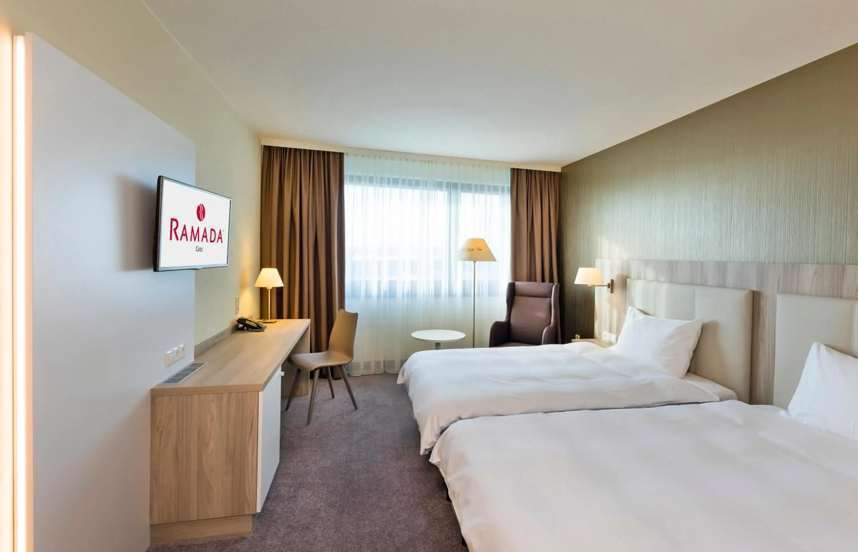 Standard Queen Room with Two Queen Beds in Hotel Ramada by Wyndham Graz Standard Queen Room with Two Queen Beds in Hotel Ramada by Wyndham Graz