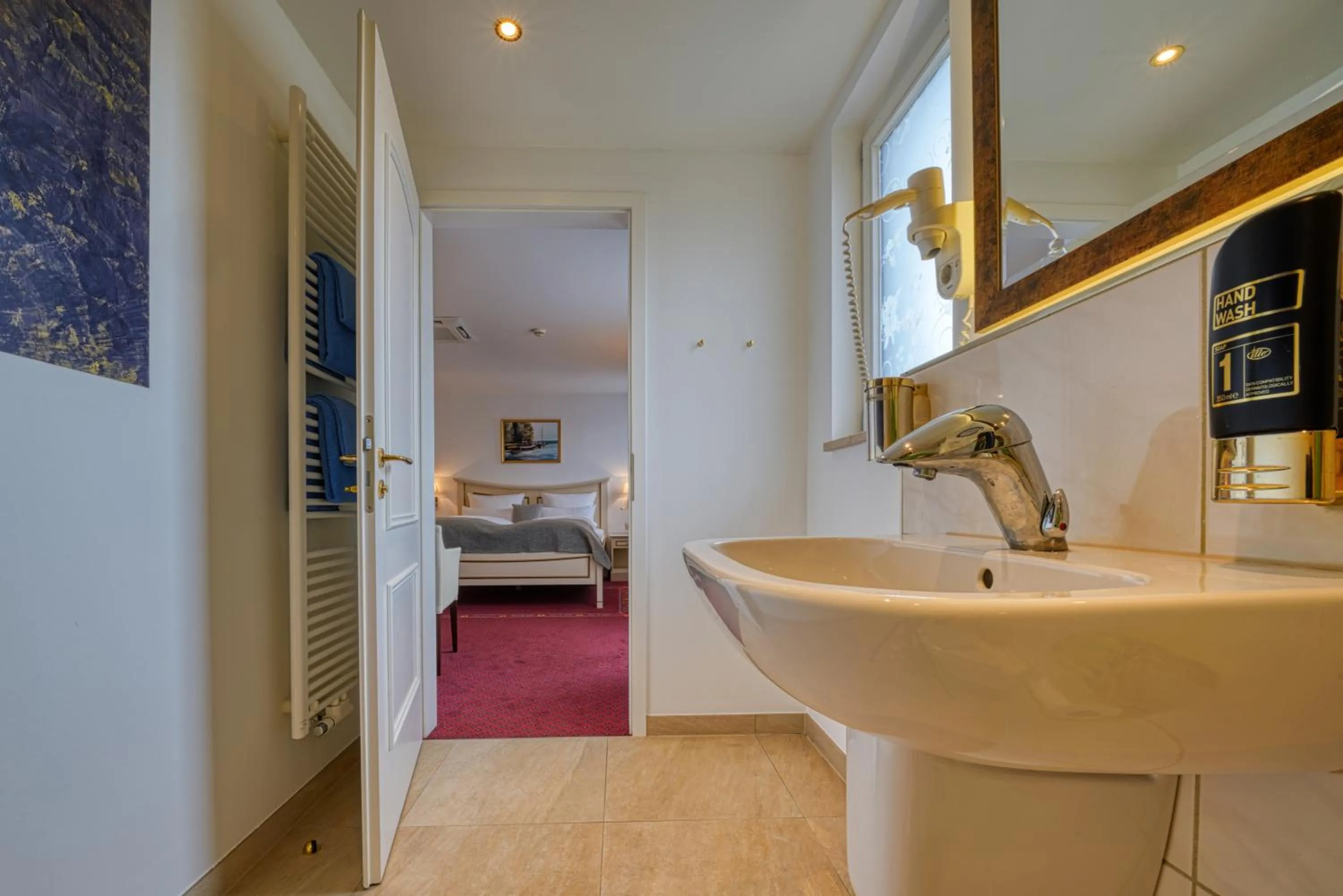 Bathroom, Bed in Hotel Seeblick Wismar