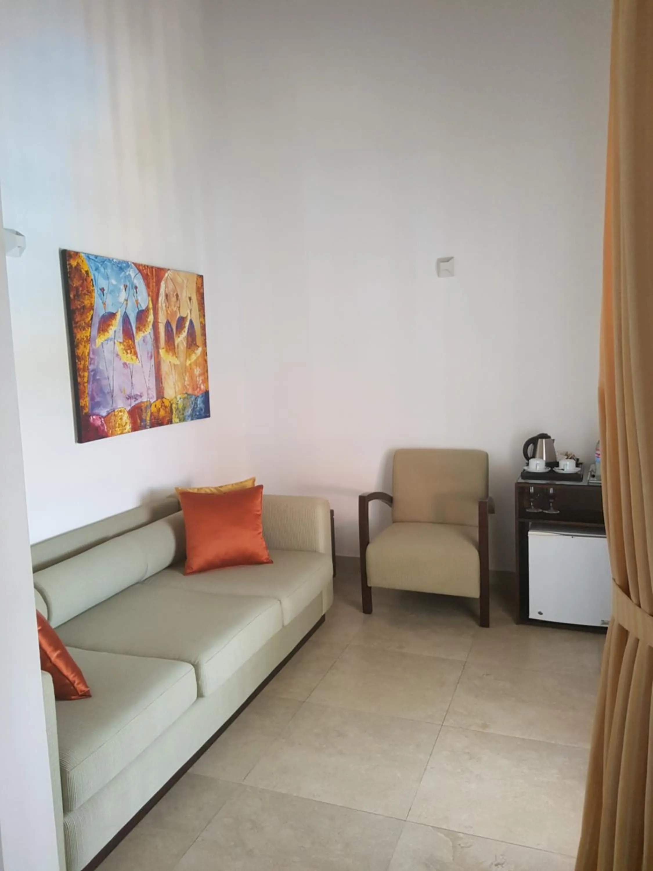 Seating area in IMAGINE Villa Hotel