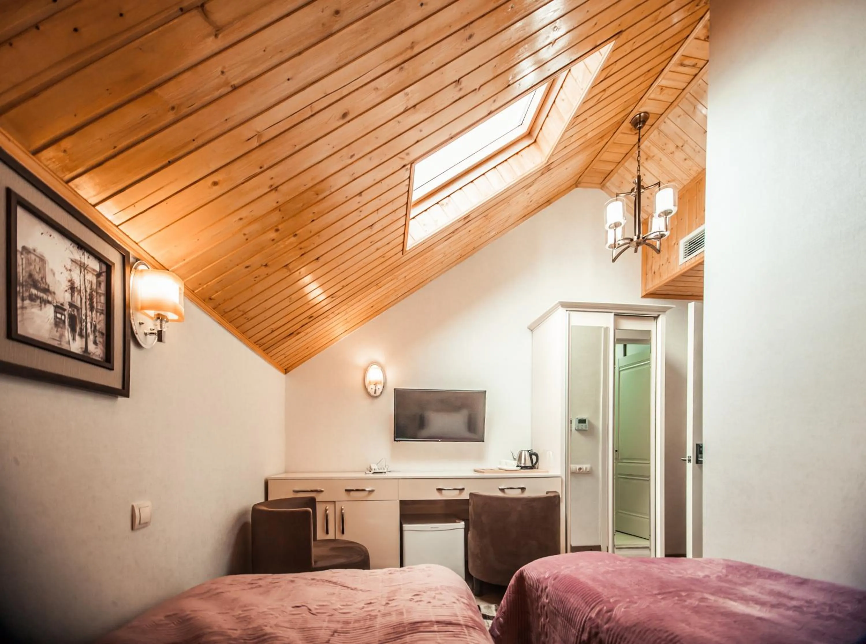 Bed in MUSMORE Boutique Hotel