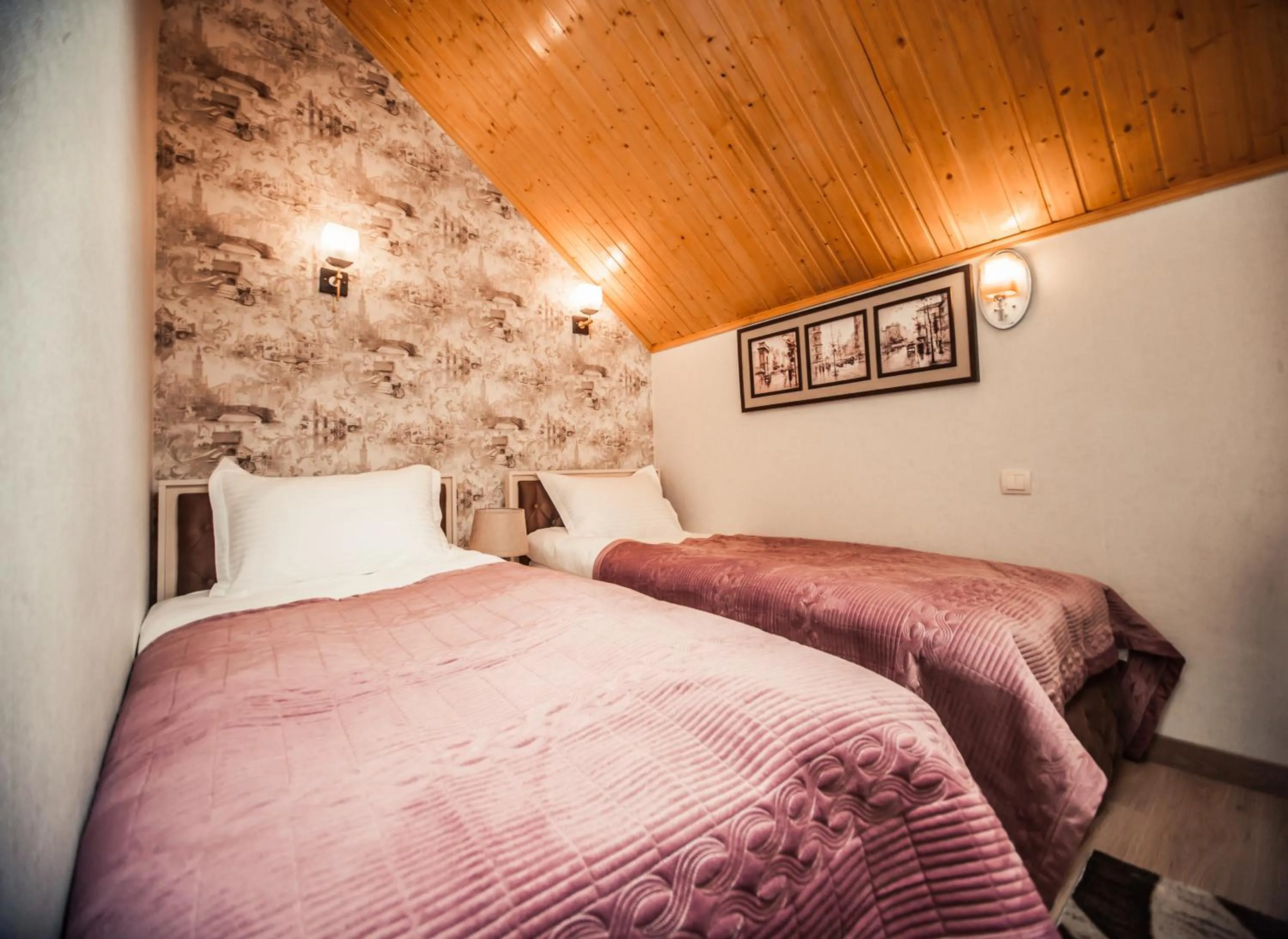 Bed in MUSMORE Boutique Hotel