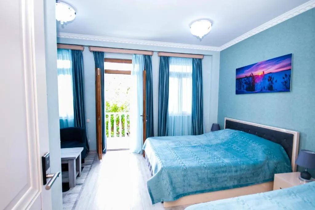 Bed in MUSMORE Boutique Hotel