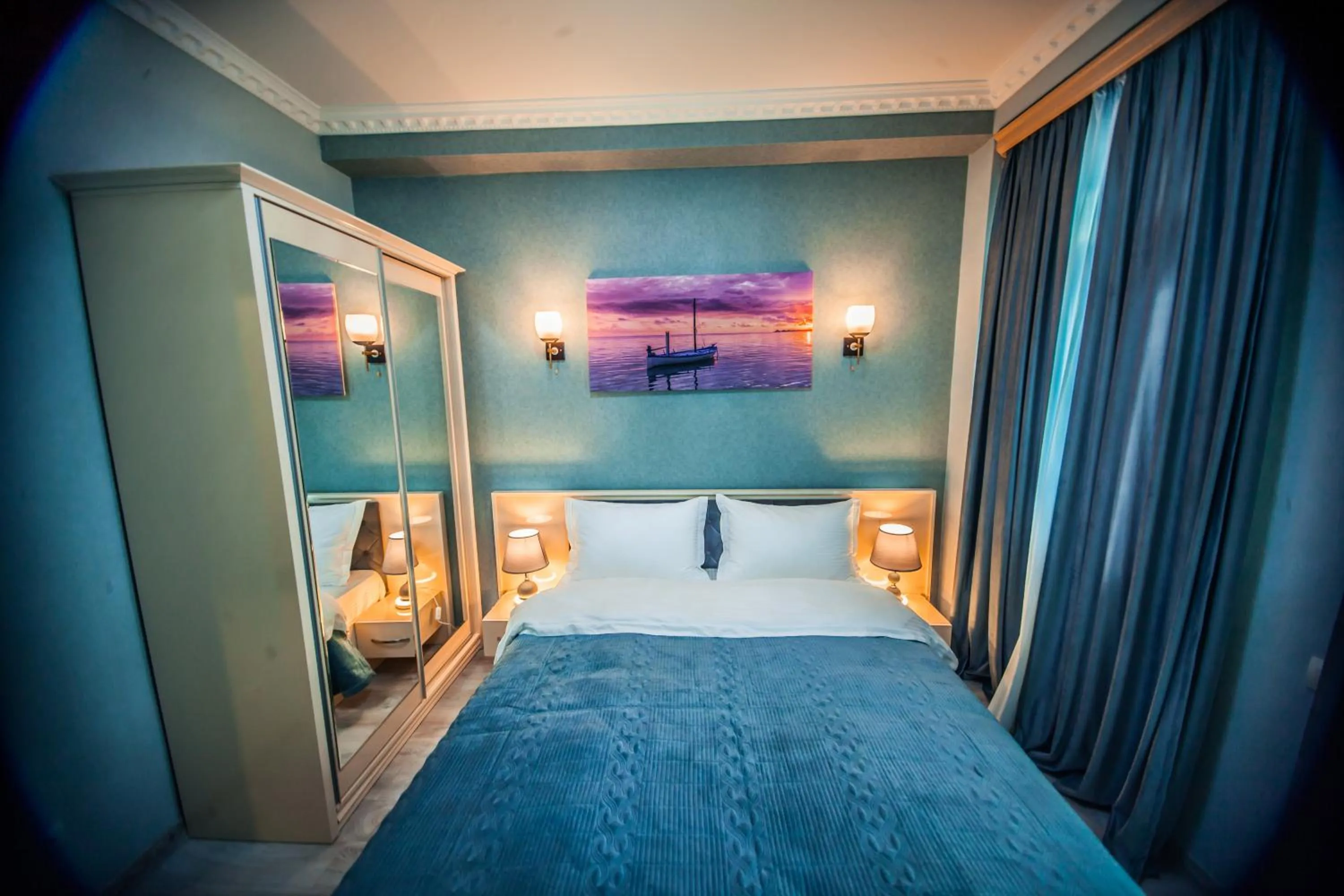 Bed in MUSMORE Boutique Hotel