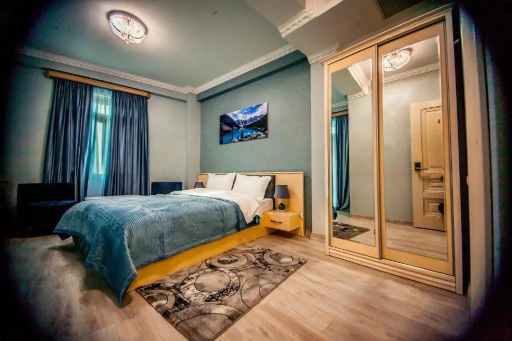 Bed in MUSMORE Boutique Hotel