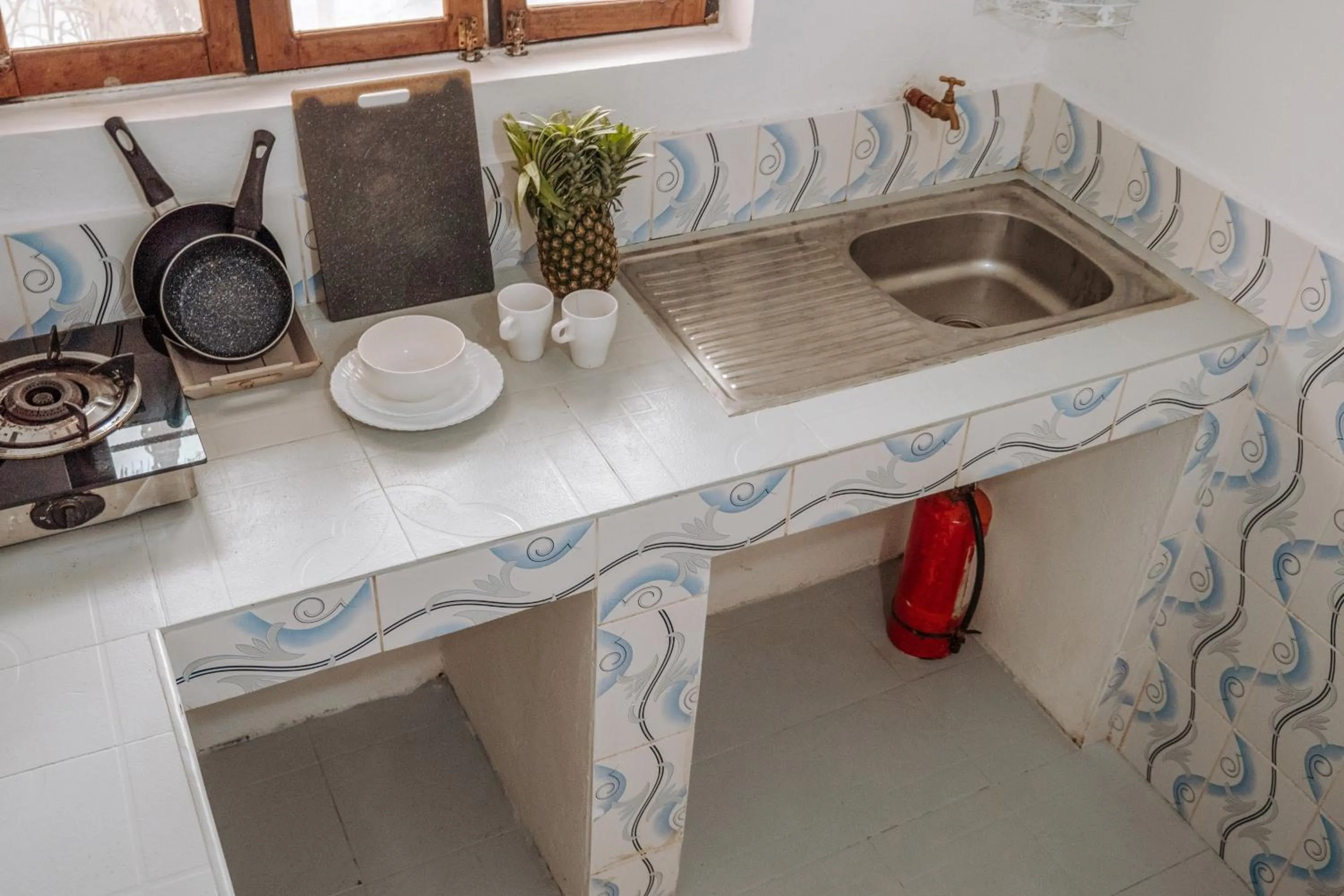 Kitchen or kitchenette in Zanzibar Gem Beach Bungalows