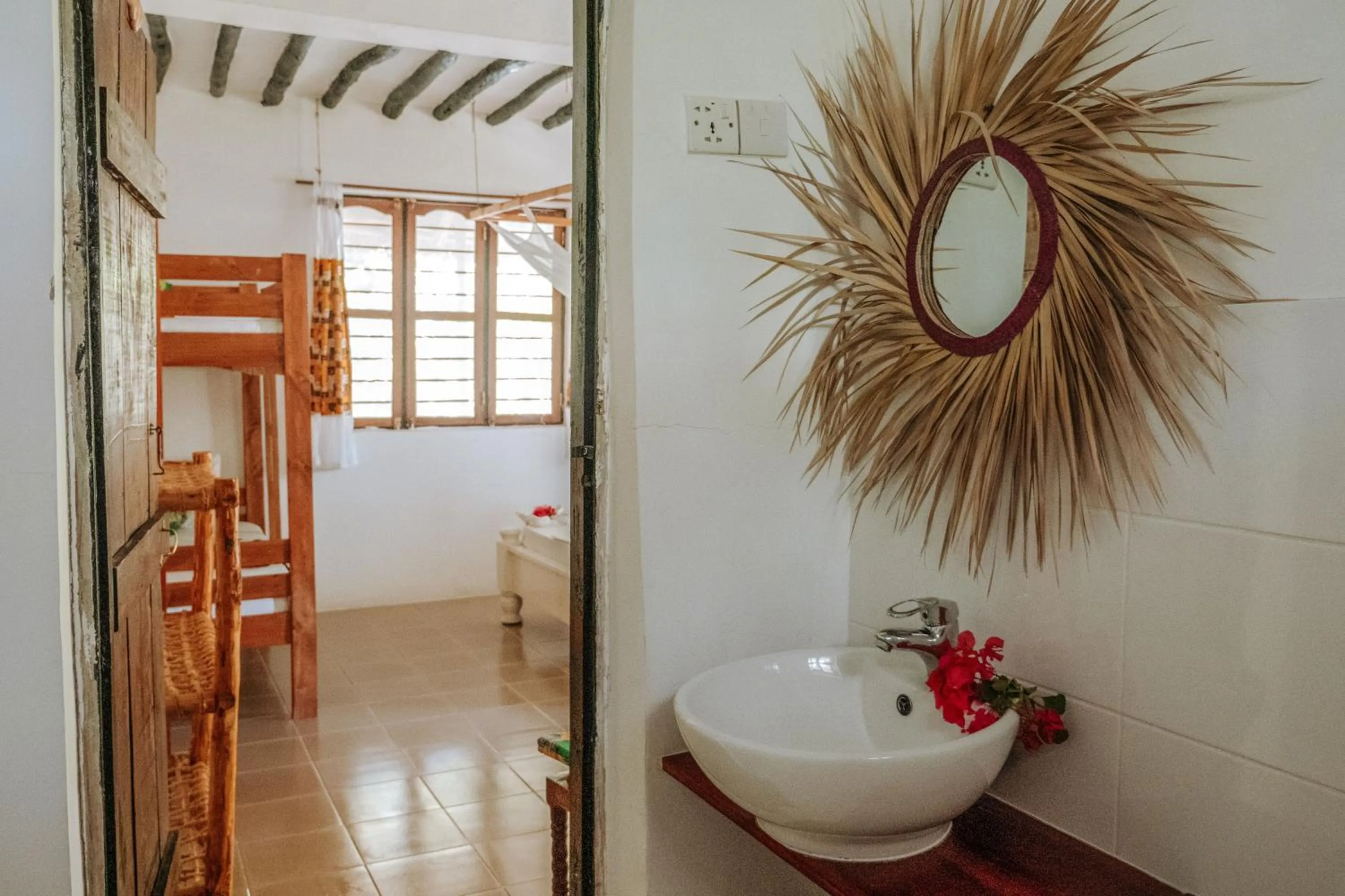 Bathroom, Bed in Zanzibar Gem Beach Bungalows