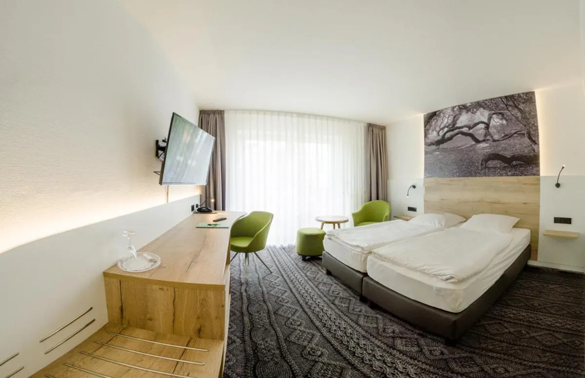 Photo of the whole room, Bed in Landgasthaus Fischer