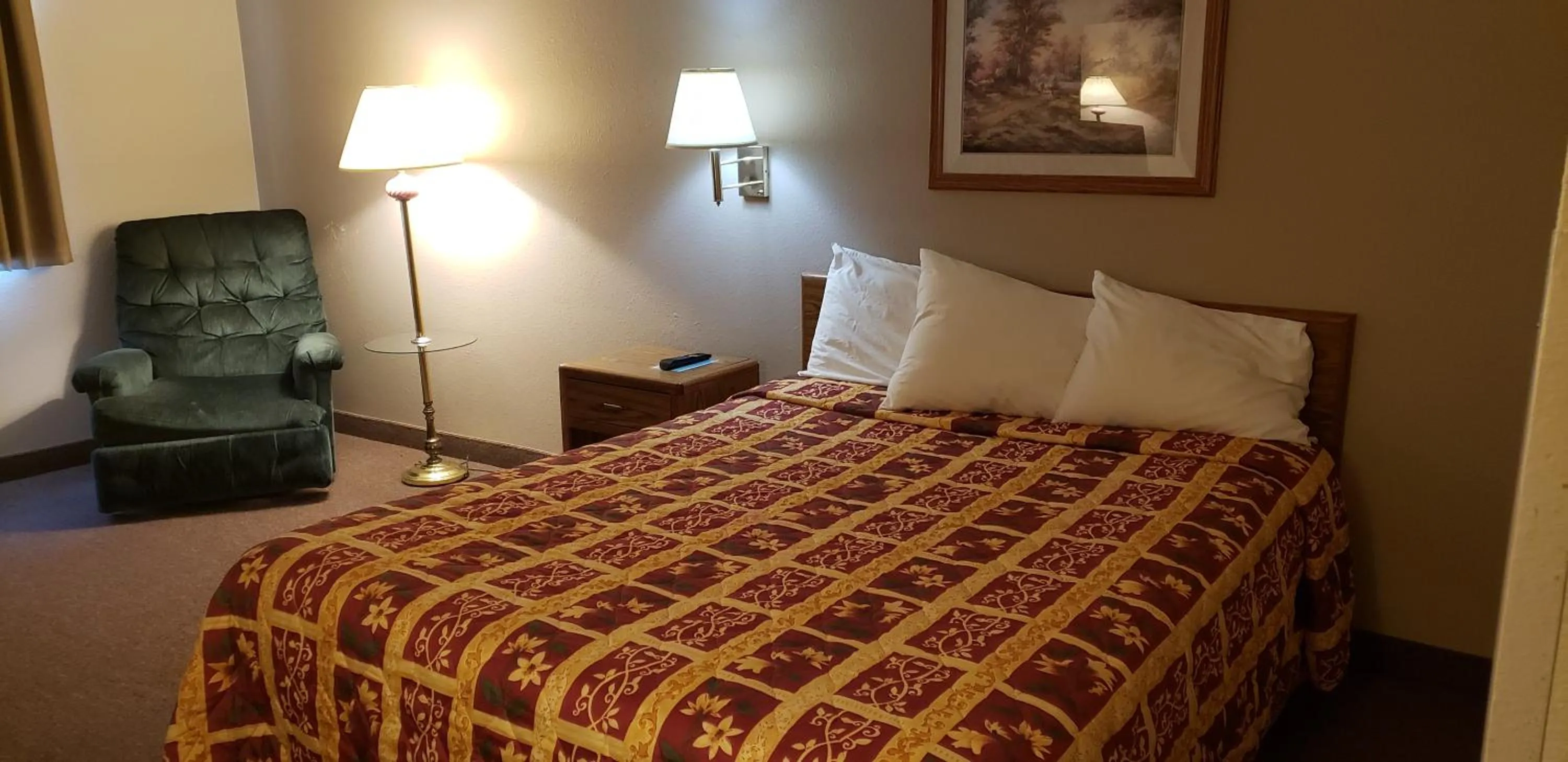 Bed in STAY INN Burlington