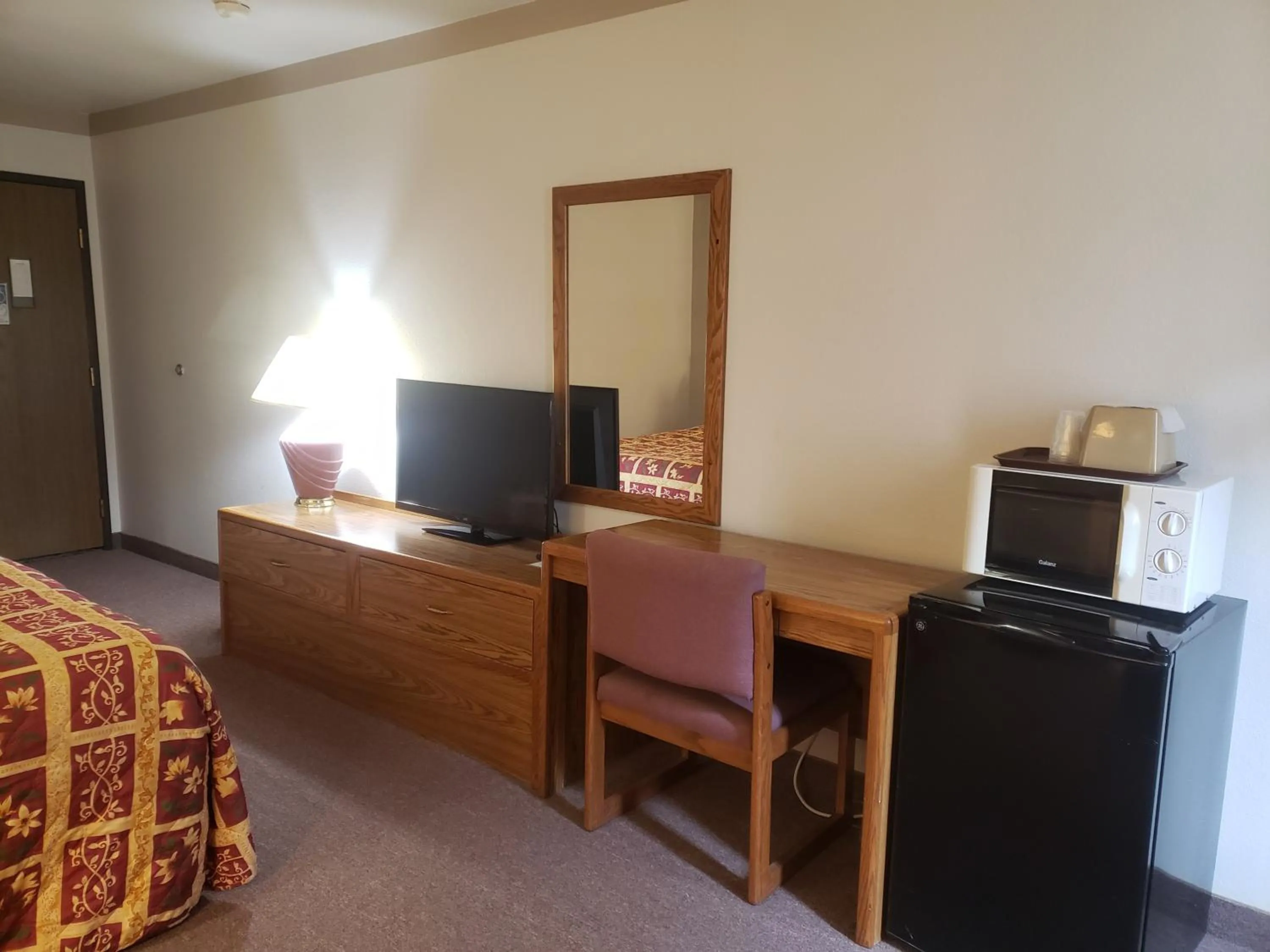 Bed in STAY INN Burlington