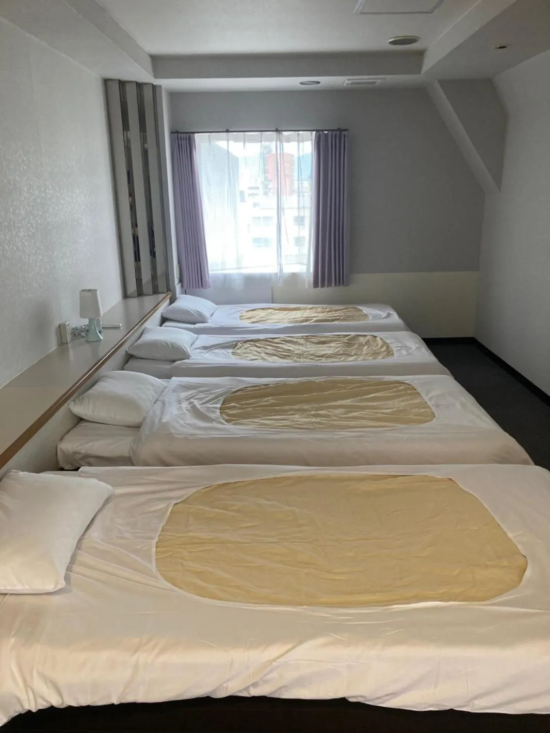 Bedroom, Bed in J-Hoppers Beppu Guesthouse ジェイホッパーズ別府ゲストハウス