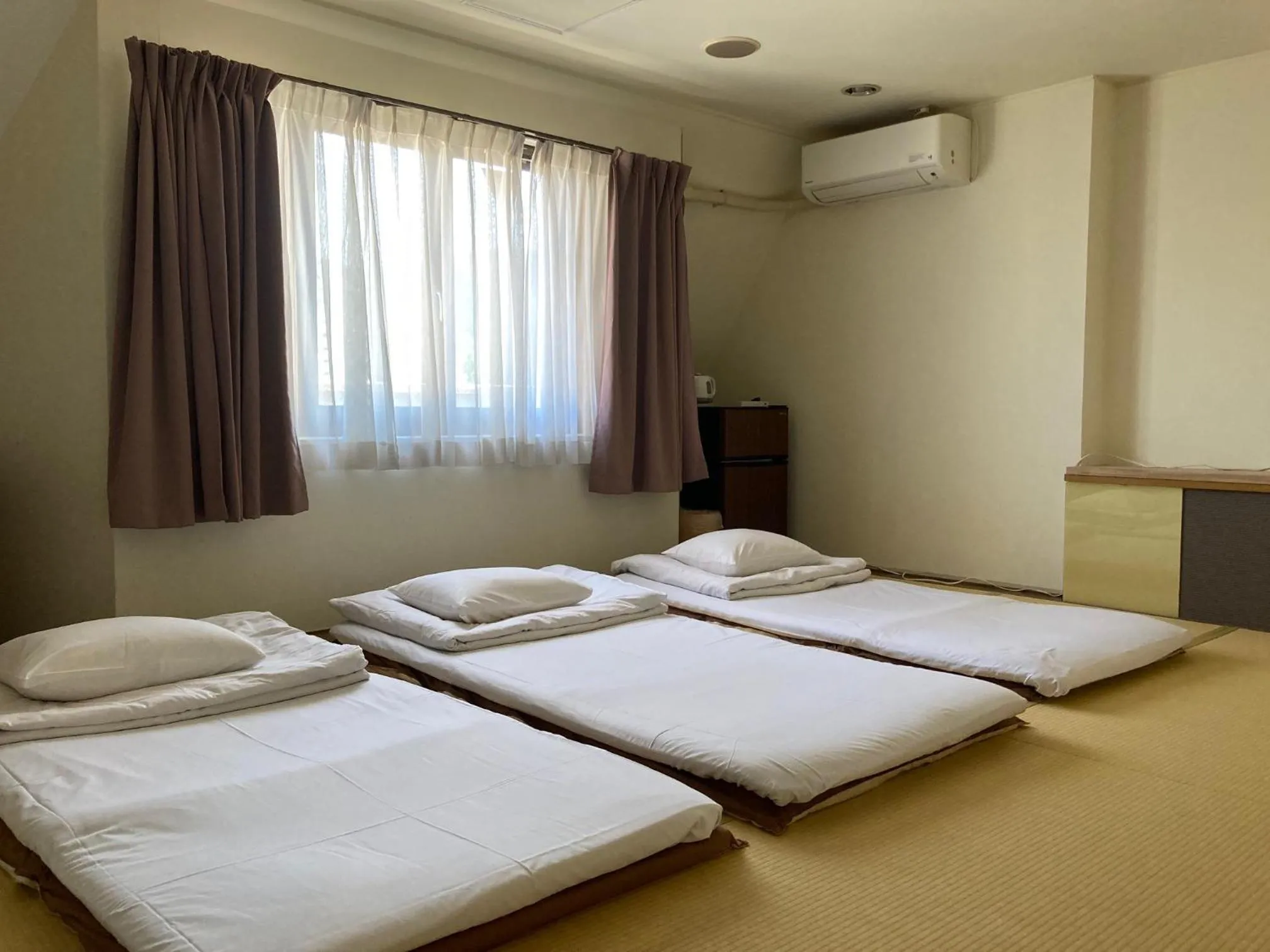 Photo of the whole room, Bed in J-Hoppers Beppu Guesthouse ジェイホッパーズ別府ゲストハウス