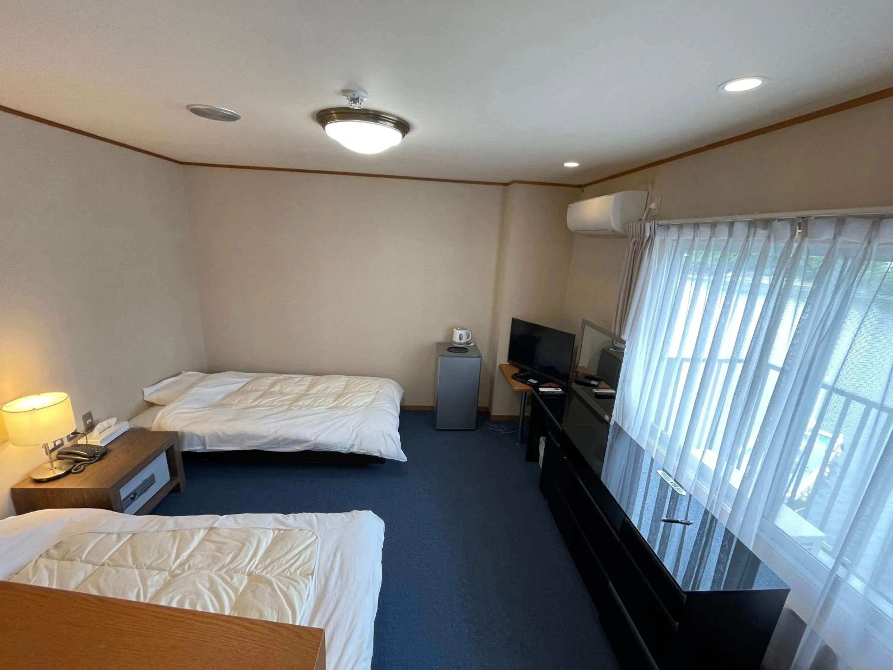 Photo of the whole room, Bed in Marina Hotel Kaikuu