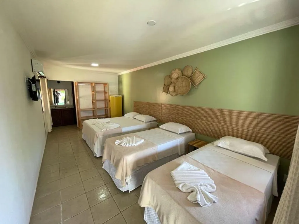 Bed in MUTA PRAIA HOTEL