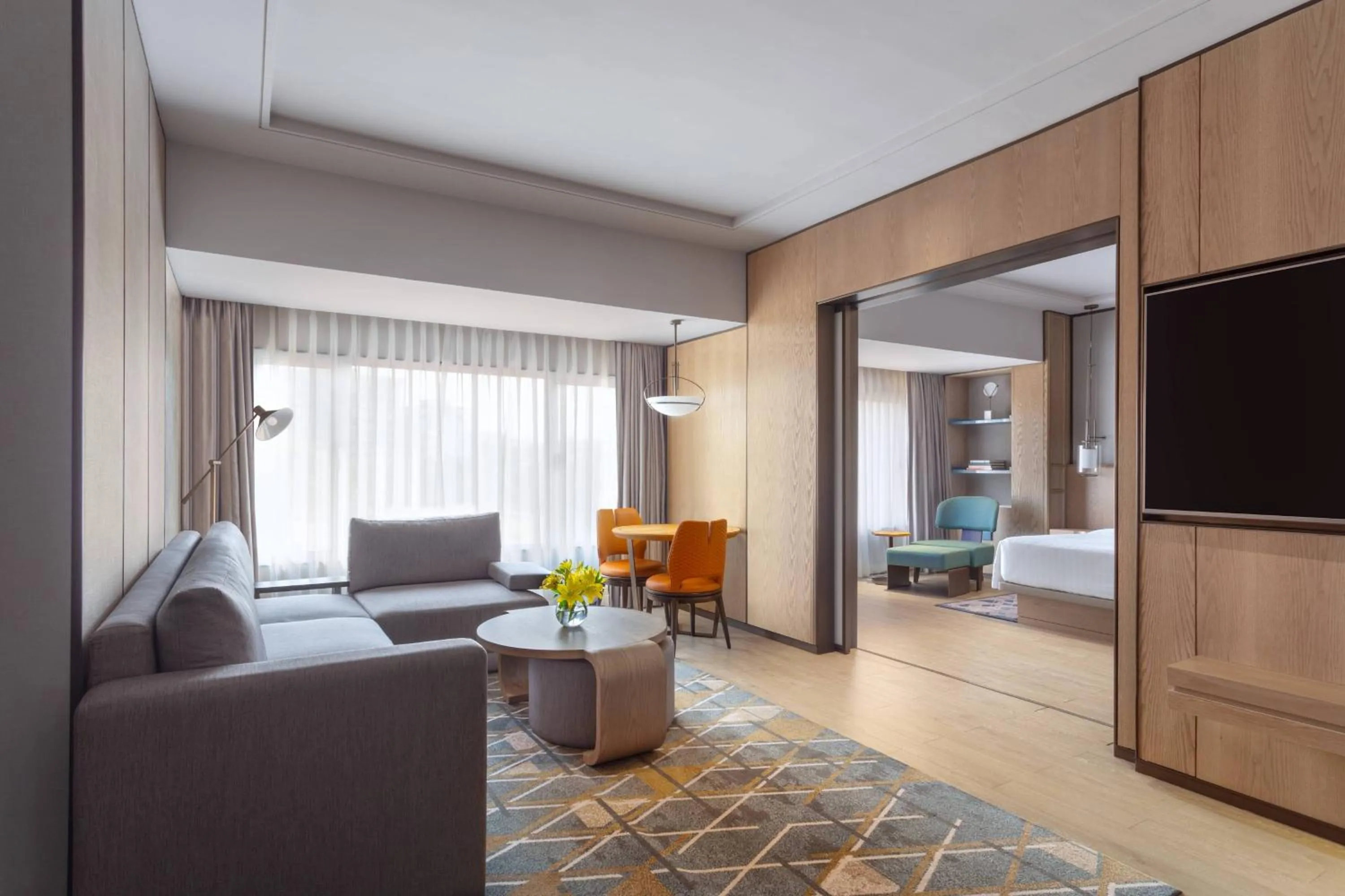 Living room, Bed in Surat Marriott Hotel