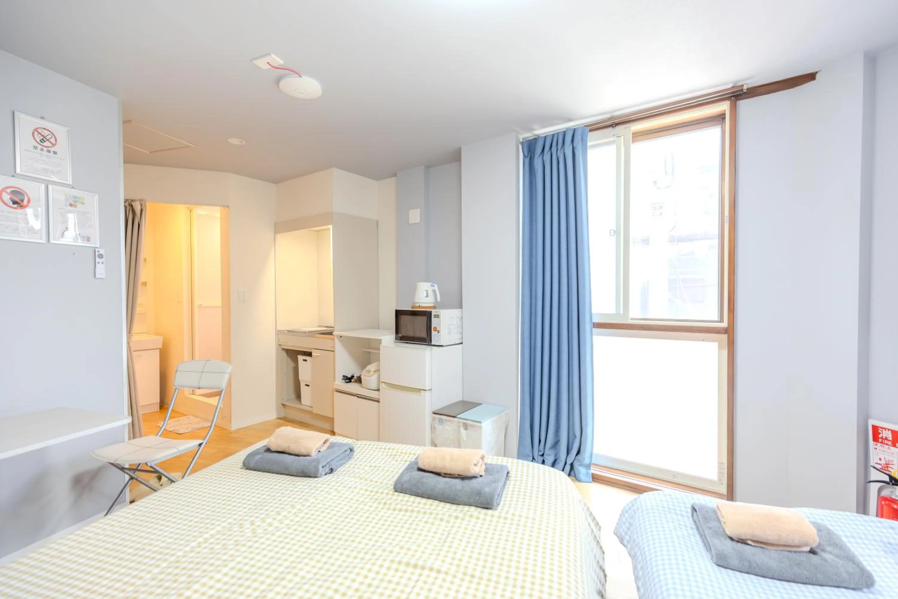 Bed in 武蔵Musashi Hotel