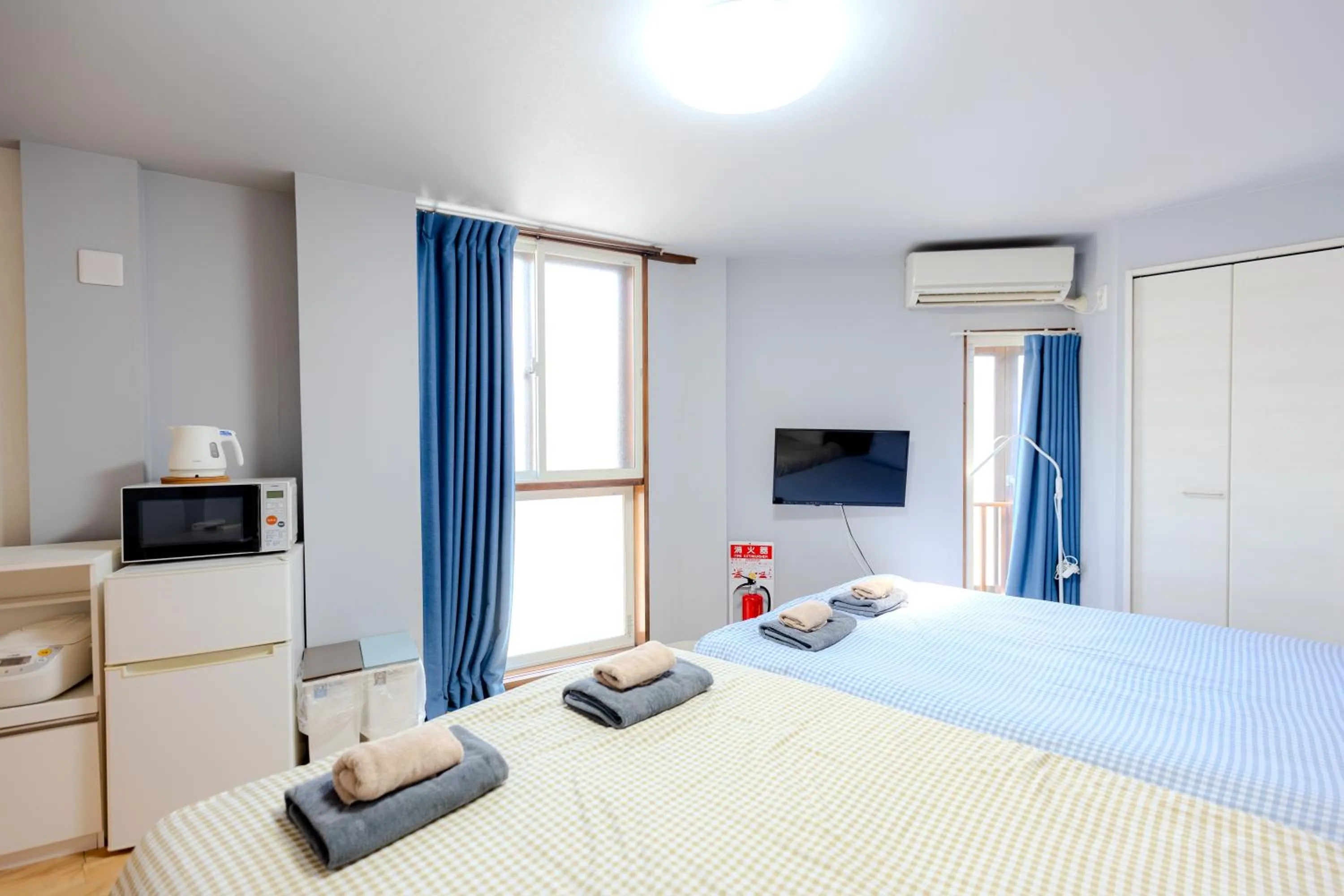 Bed in 武蔵Musashi Hotel