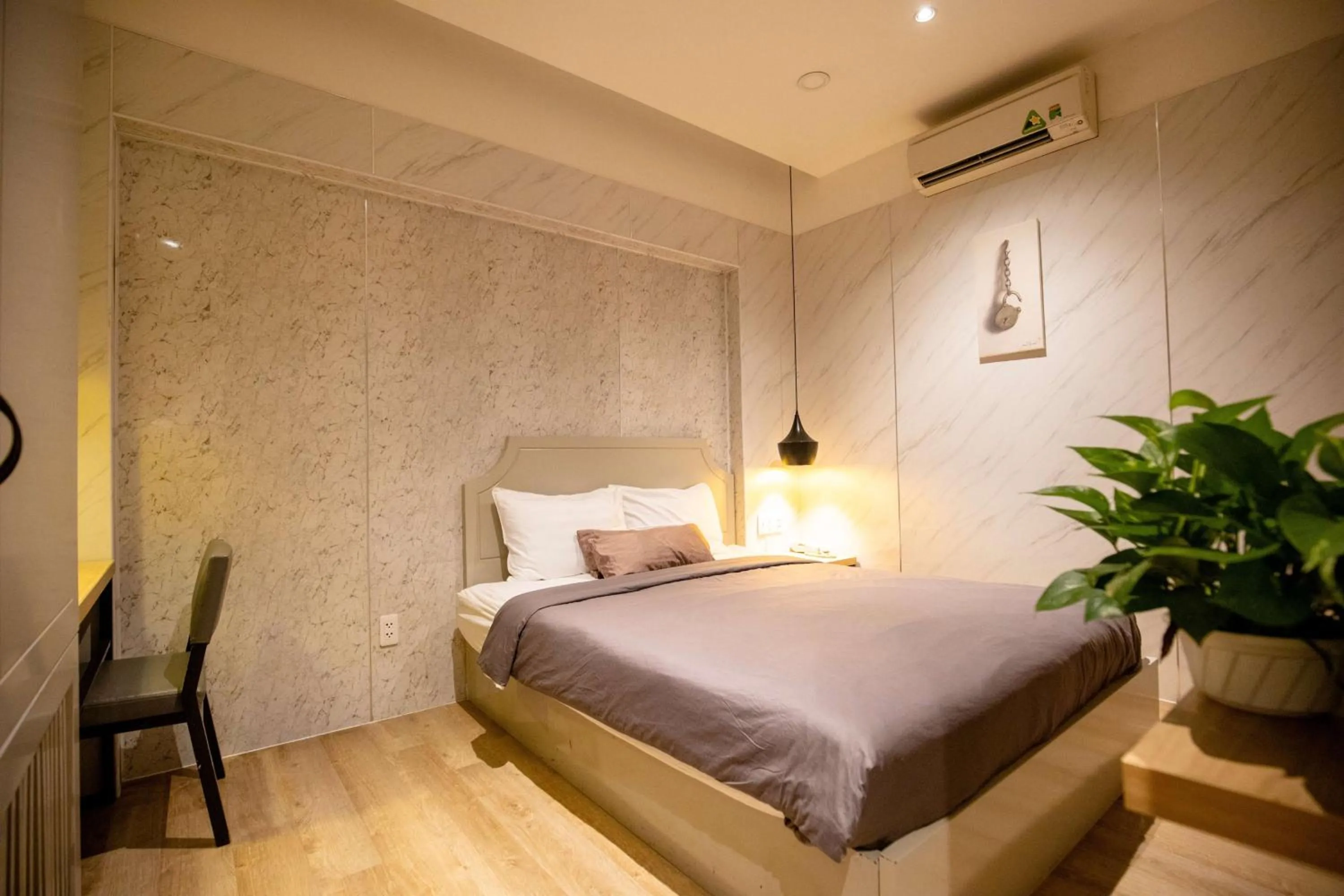 Bed in Lá Hotel Q10