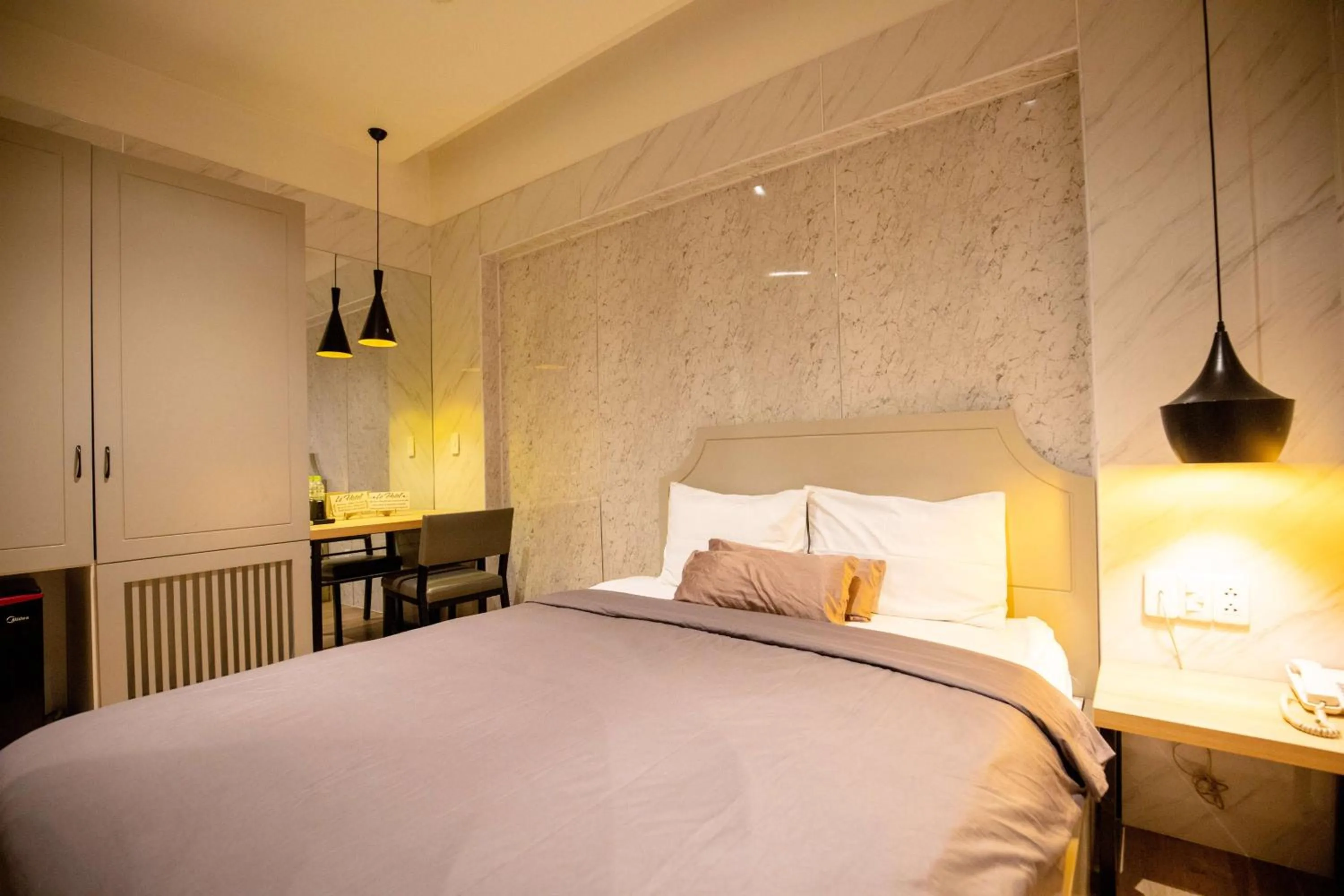 Bed in Lá Hotel Q10